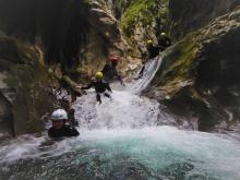 Follow certified canyoning guides through the gorge