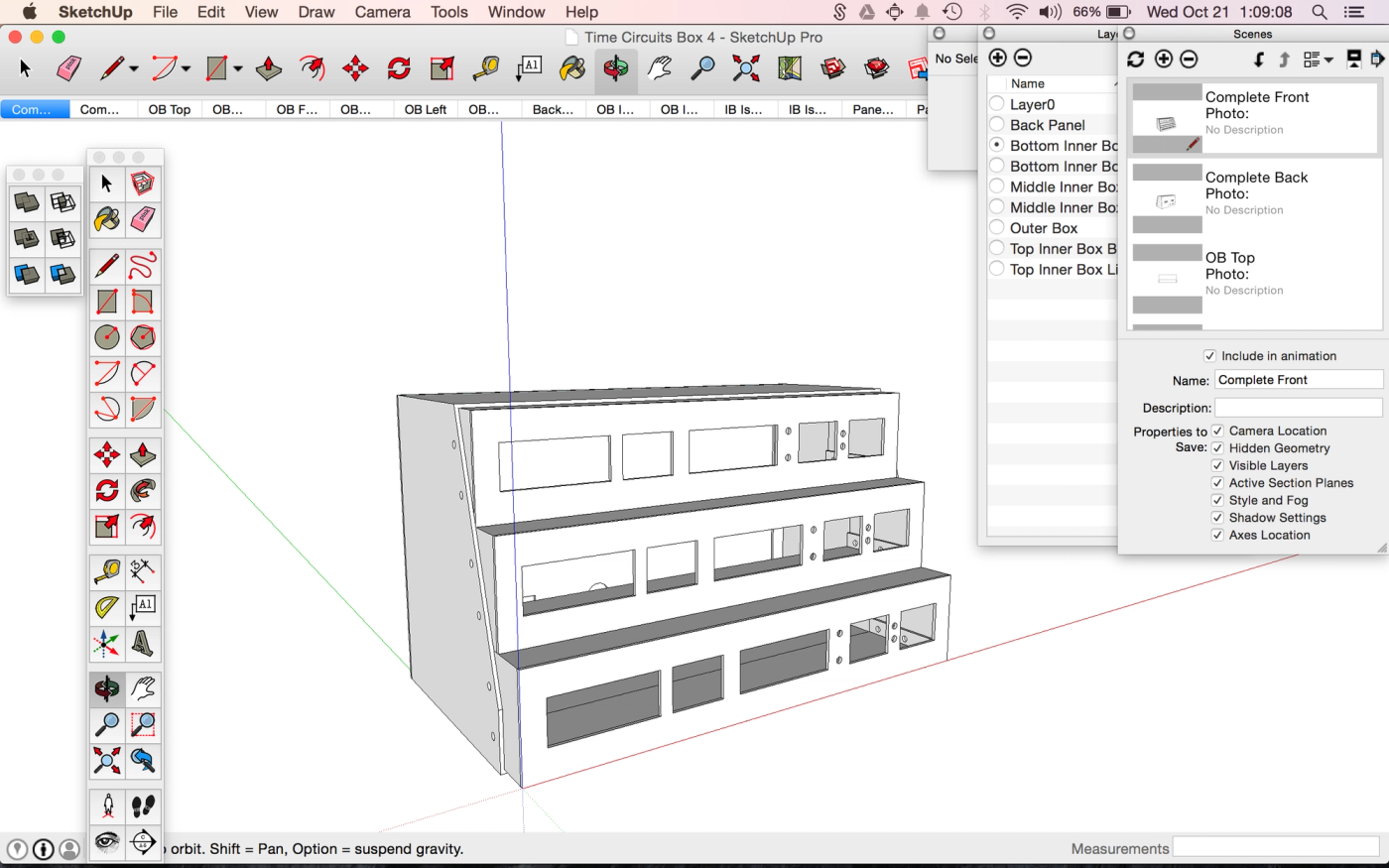 a computer screen shows a drawing of a building in sketchup pro