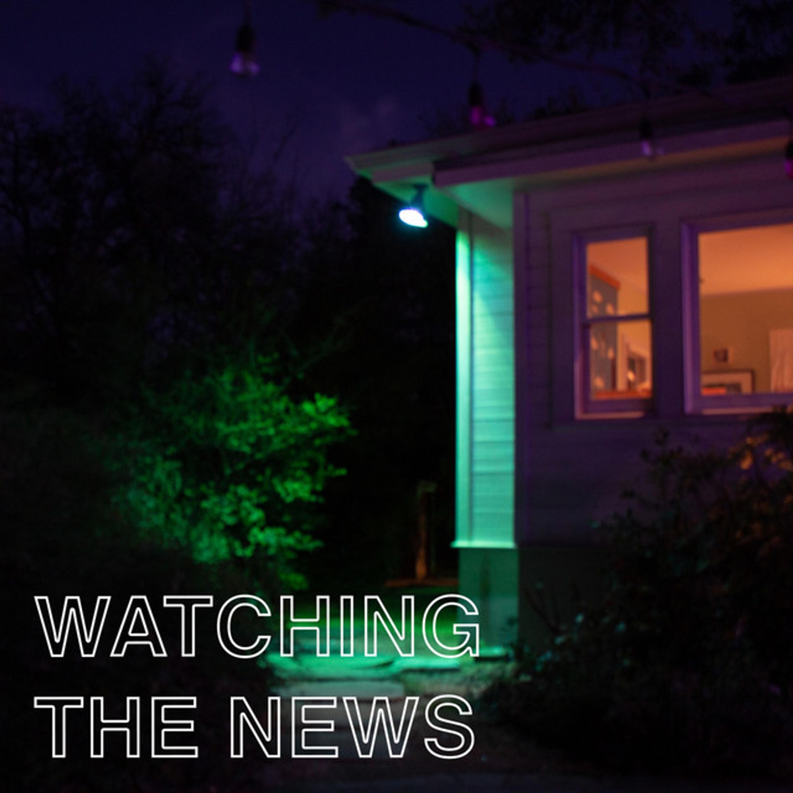 a picture of a house at night with the words watching the news below it