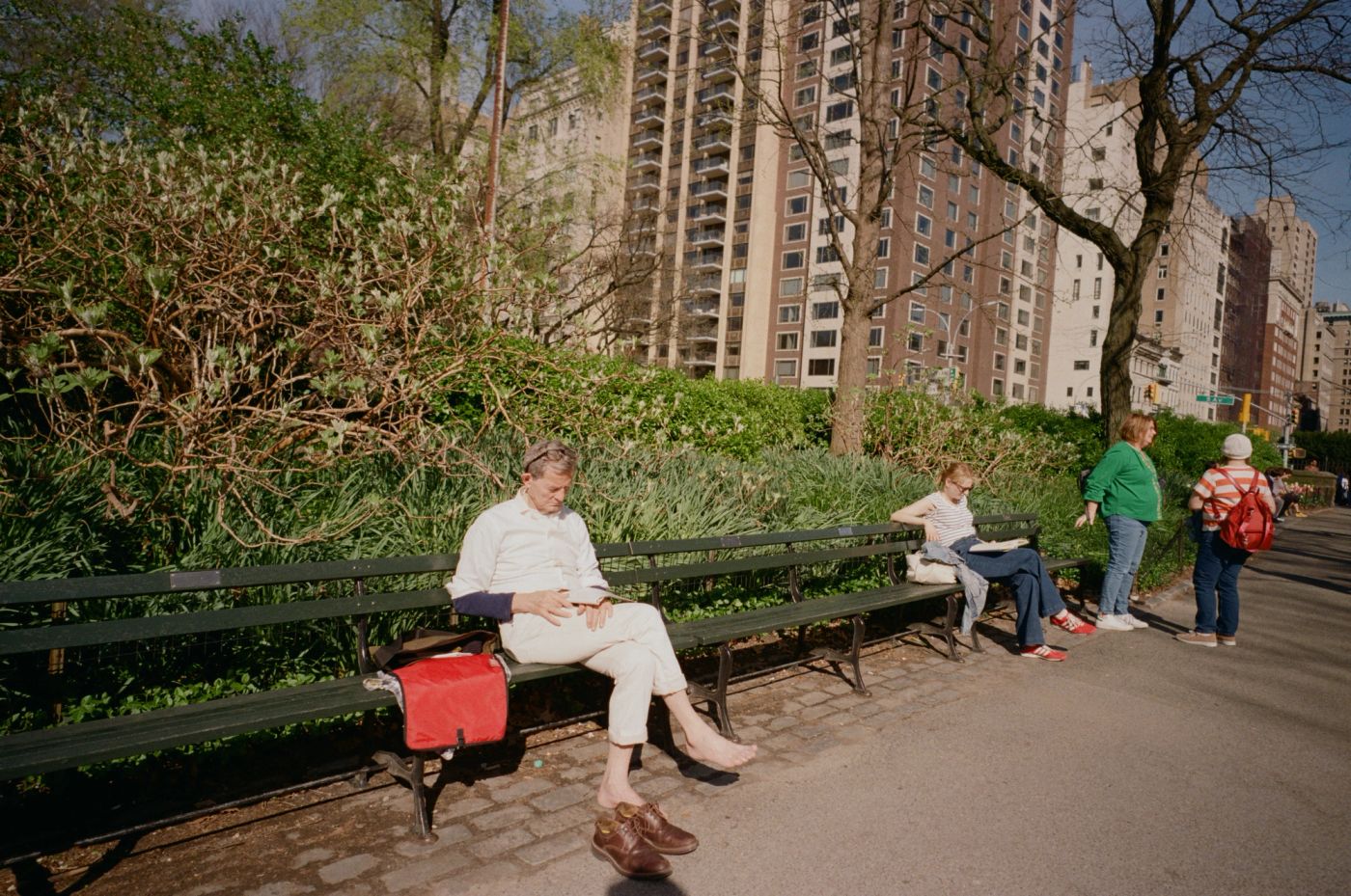 man in central park barefoot