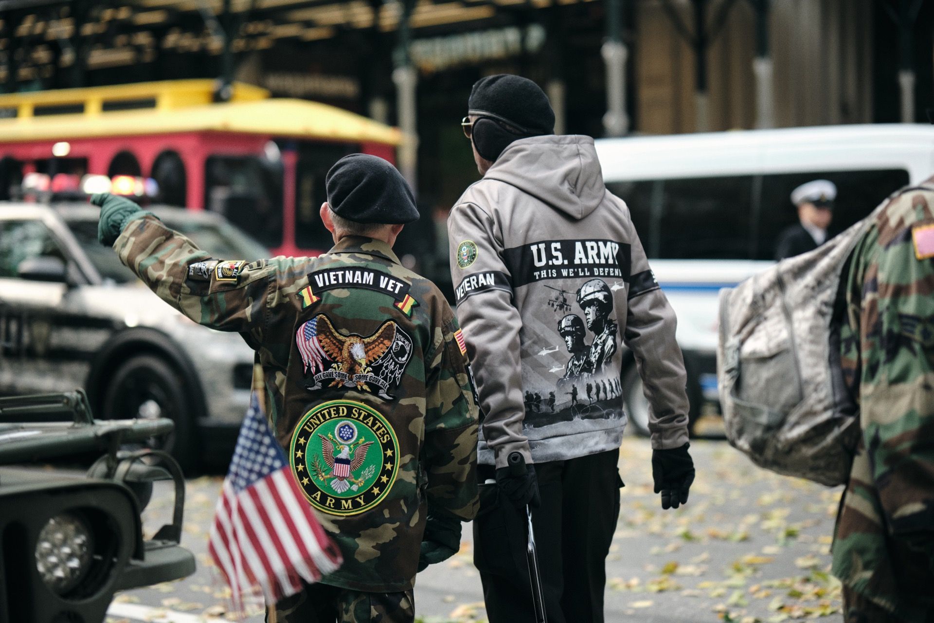 Vietnam veteran and U.S. Army veteran walking together at a parade