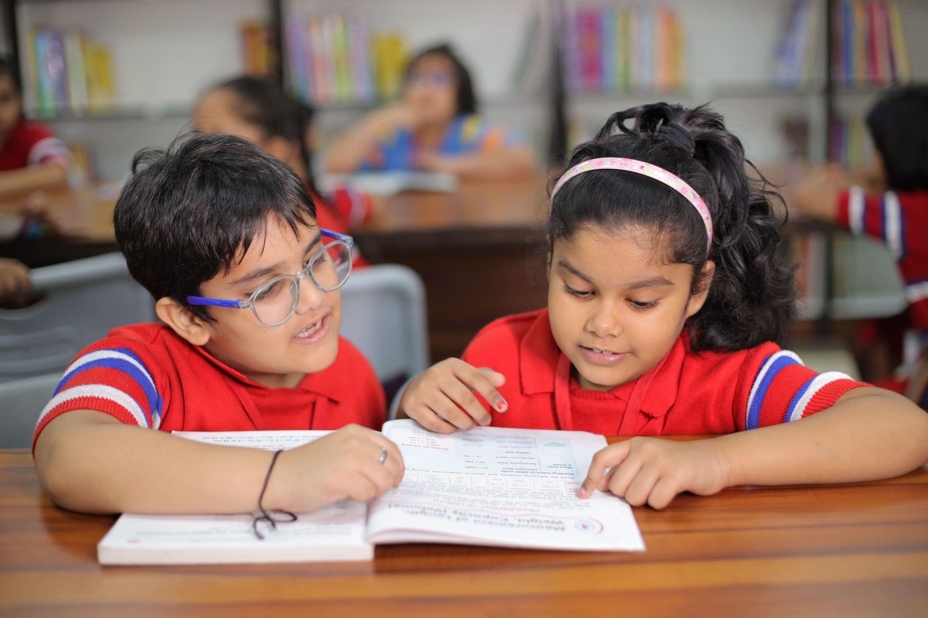 Students studying together in a bright library — Noida sector-62 professional coaching institute, Noida · Webzenia SEO case study