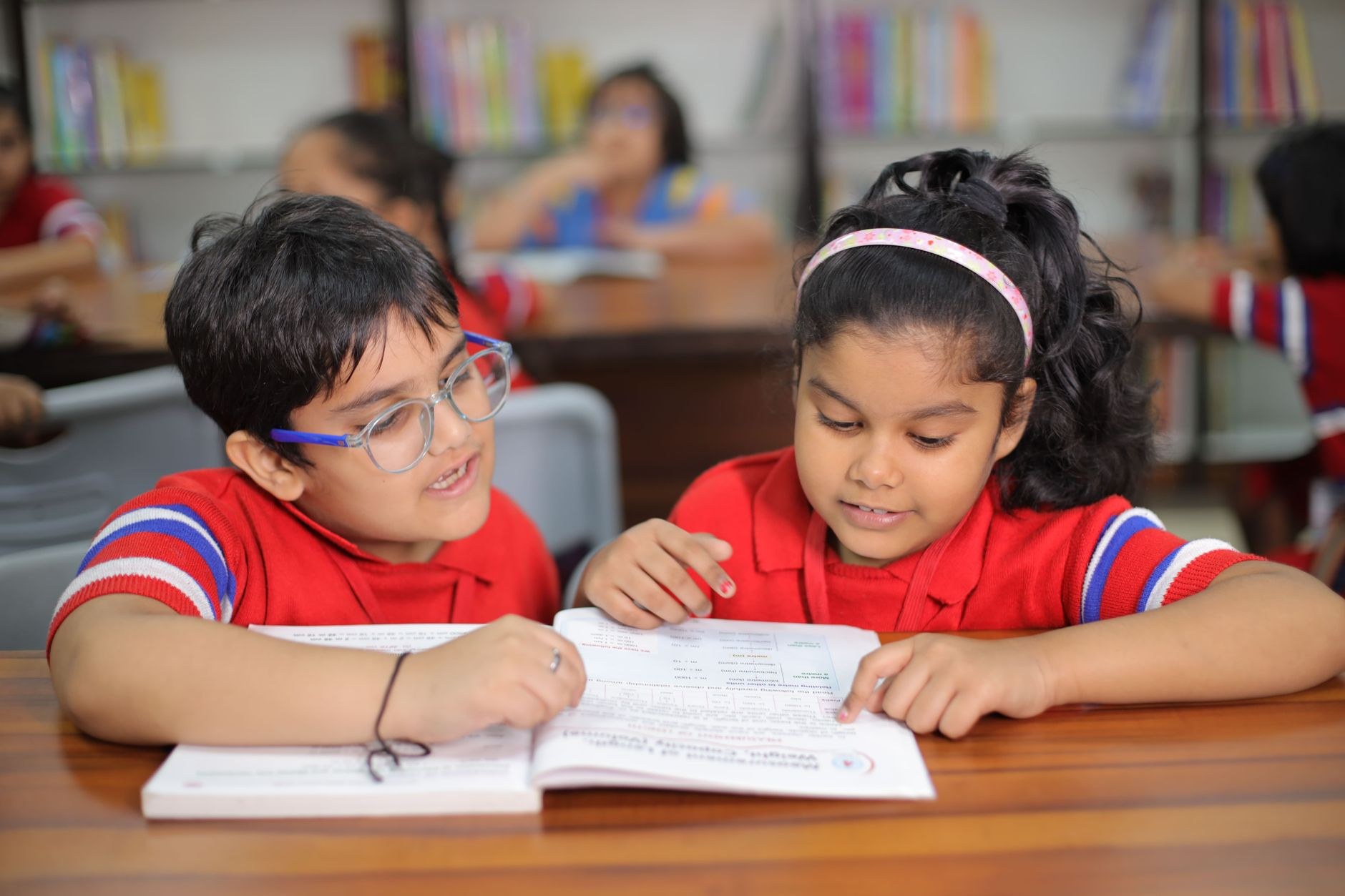 Students studying together in a bright library — Noida sector-62 professional coaching institute, Noida · Webzenia SEO case study