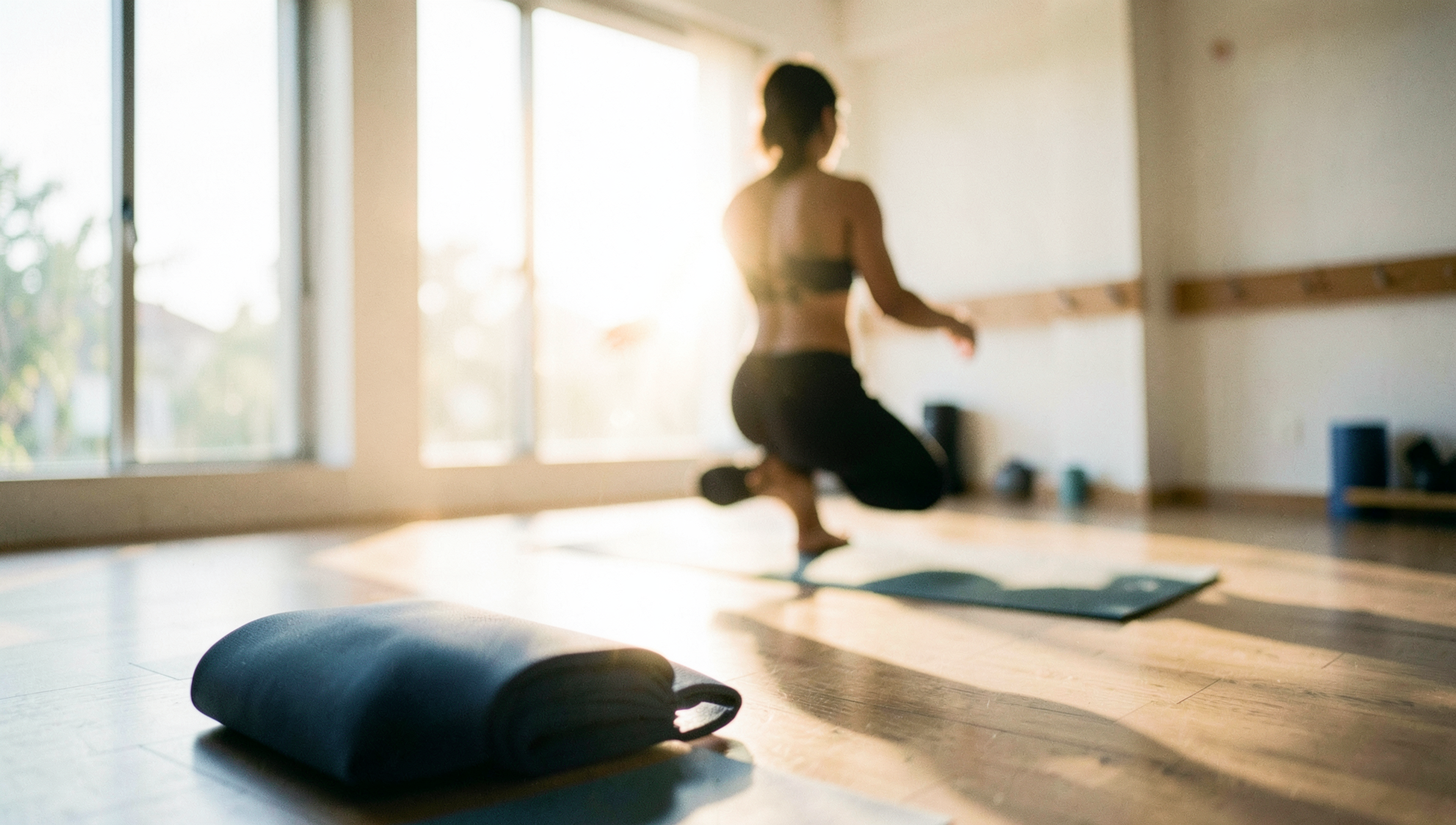Empty boutique studio interior in warm morning light — Premium Yoga and Meditation Platform, Mumbai · Webzenia Mobile App Development case study