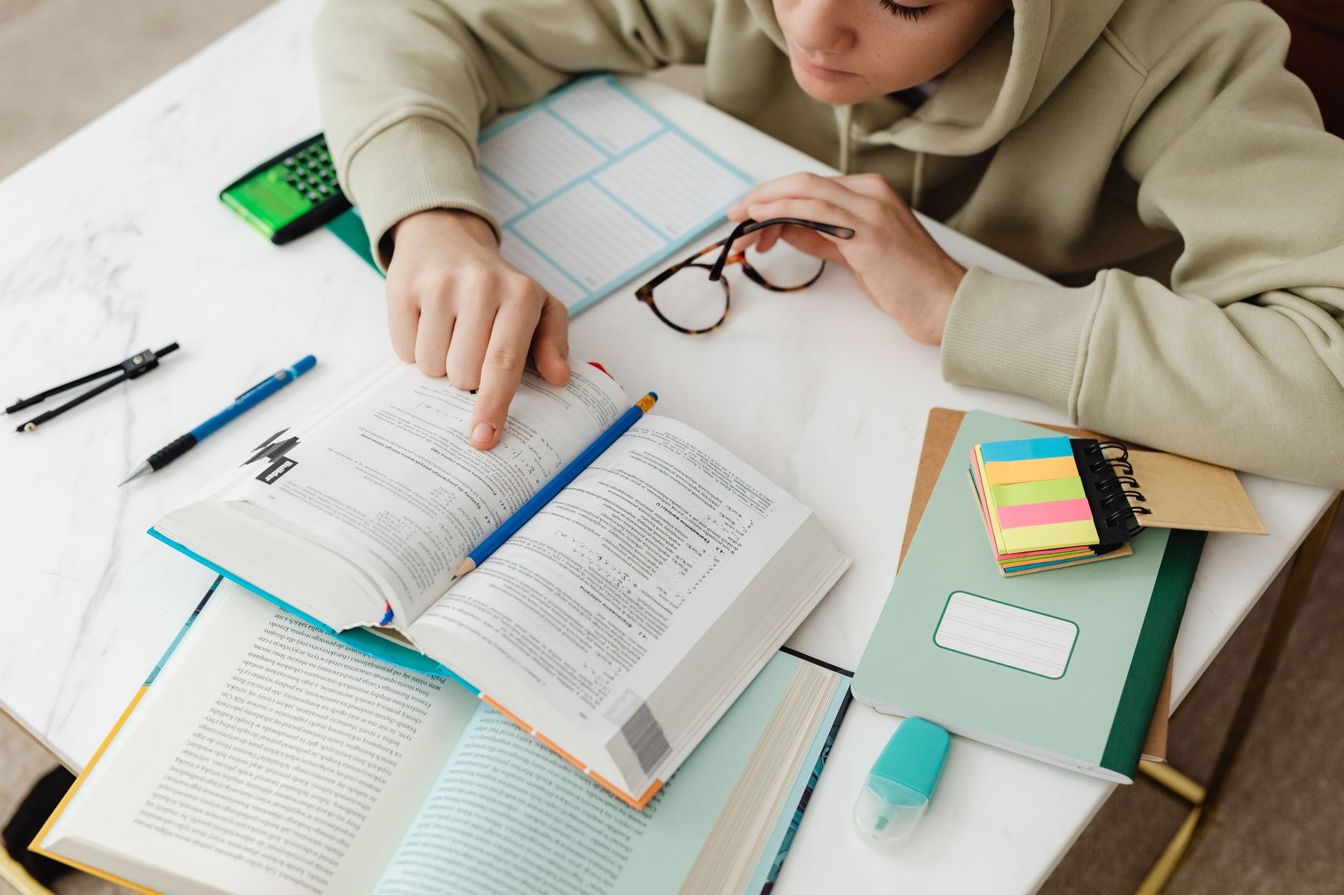 A focused student studying for exams at a desk — Online Coaching Platform (UPSC), Delhi · Webzenia Digital Marketing case study