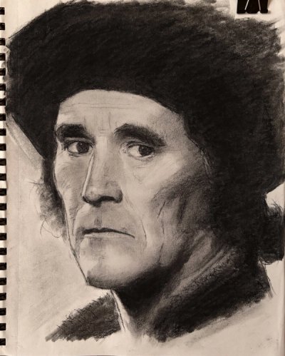 Charcoal portrait of a man in a fur hat — a self-directed study from before the author’s academic training.
