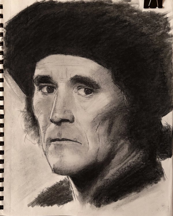 Charcoal portrait of a man in a fur hat — a self-directed study from before the author’s academic training.