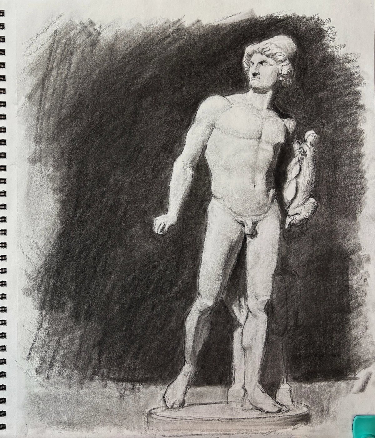 Charcoal drawing of a standing male cast figure against a dark background.