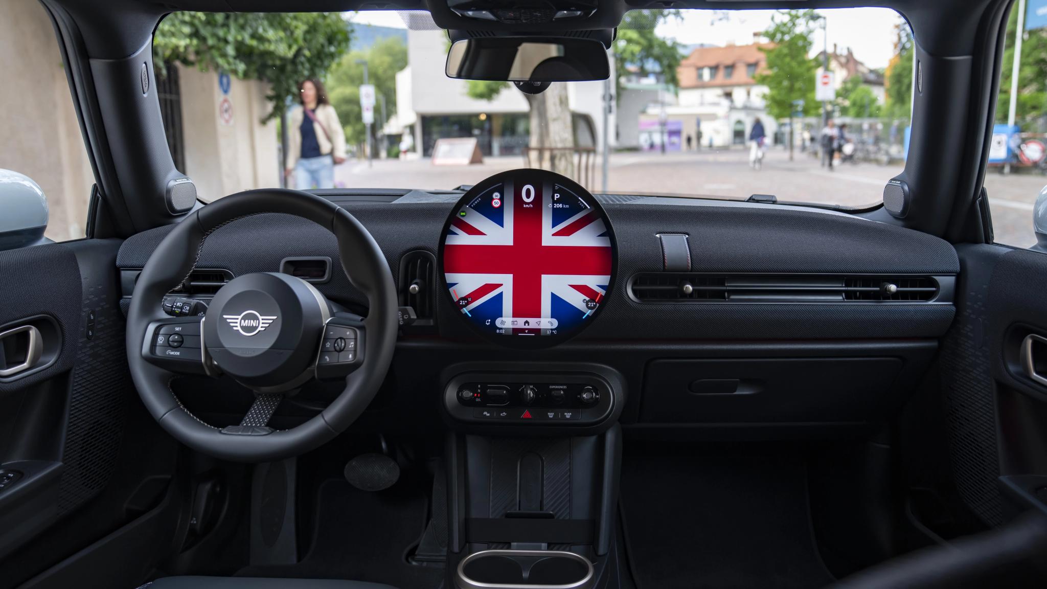  2026 MINI Cooper Oxford Edition showing Union Jack roof graphic and Indigo Sunset Blue paint