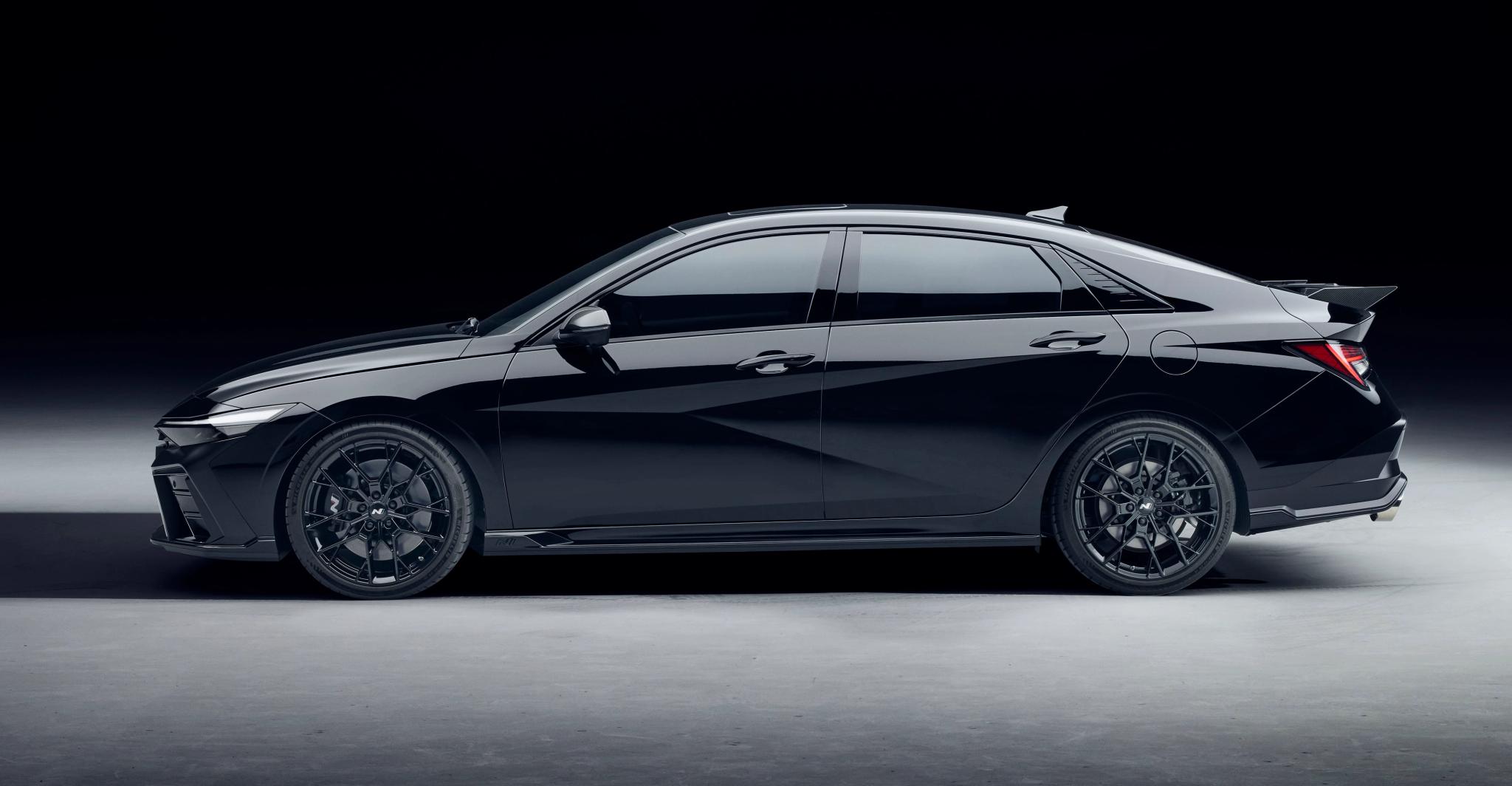 Hyundai i30 Sedan N Monochrome with forged wheels and carbon fibre rear spoiler
