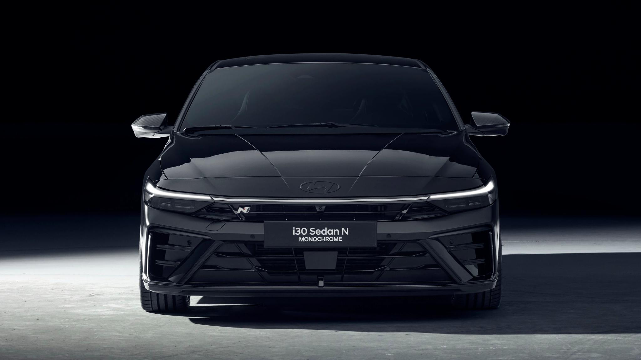 Hyundai i30 Sedan N Monochrome with forged wheels and carbon fibre rear spoiler