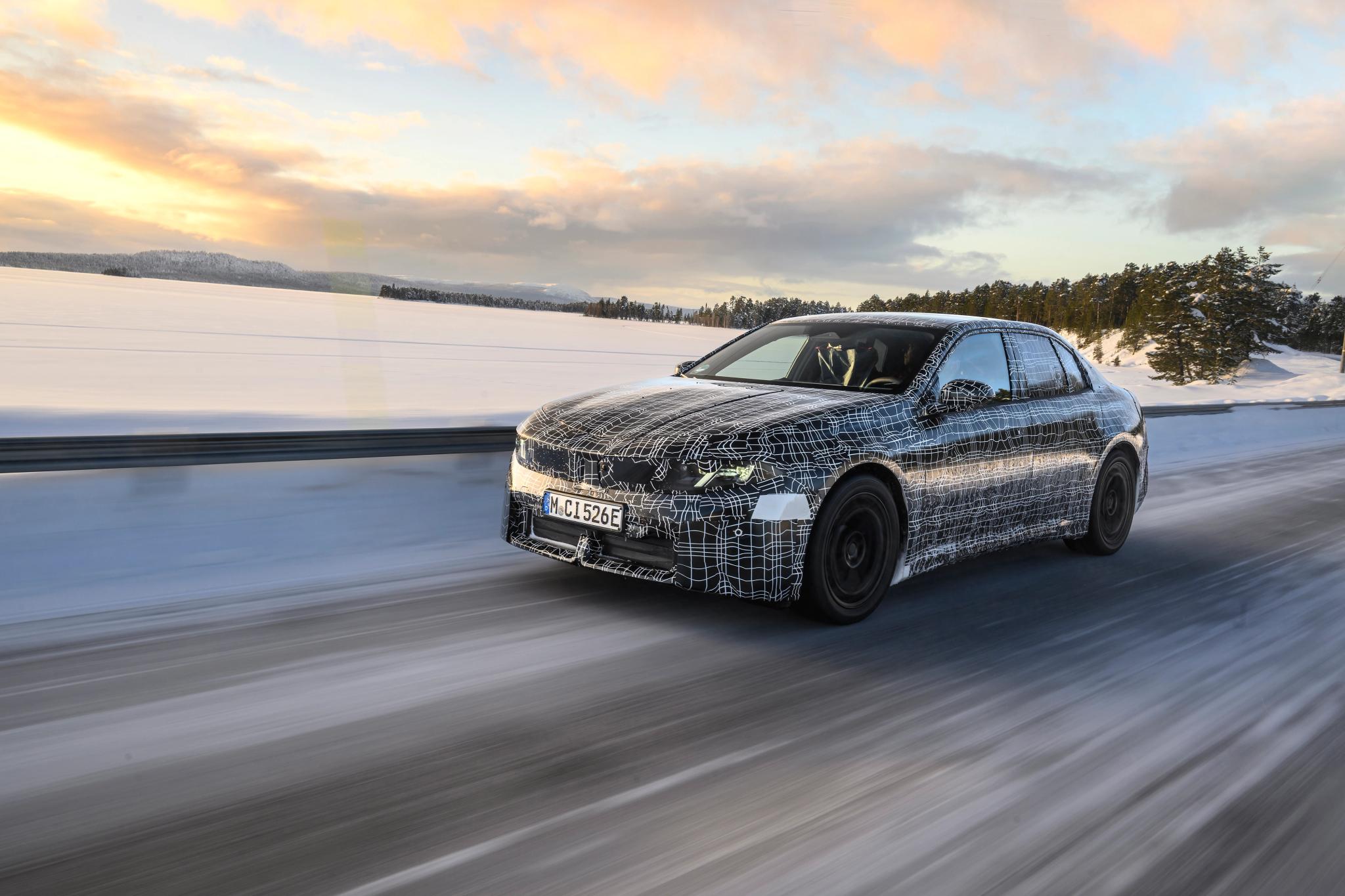 026 BMW i3 Neue Klasse sedan prototype undergoing winter testing on snow-covered roads in Arjeplog, Sweden