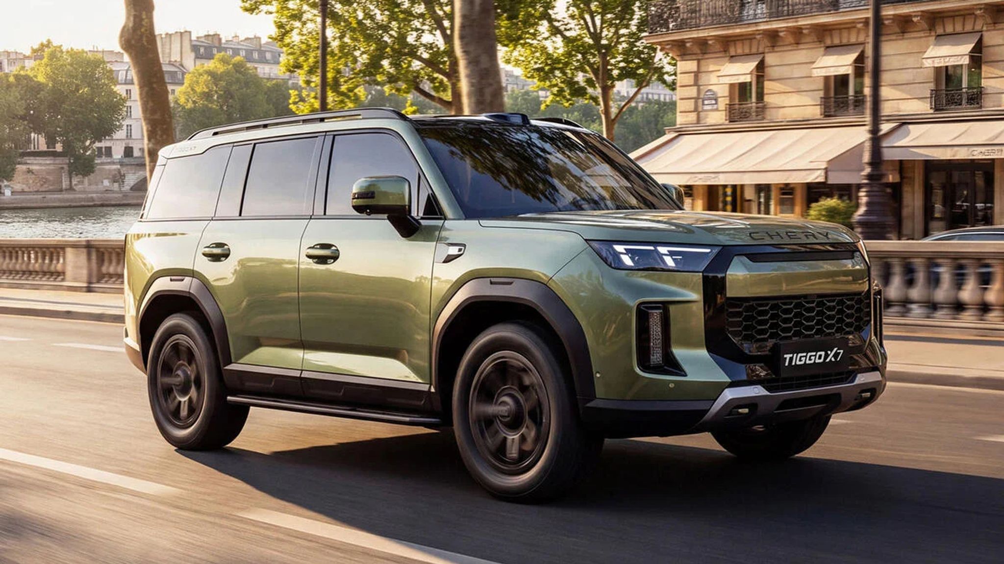 Green Chery Tiggo X7 SUV in front three-quarter view, showing boxy styling and all-terrain tyres