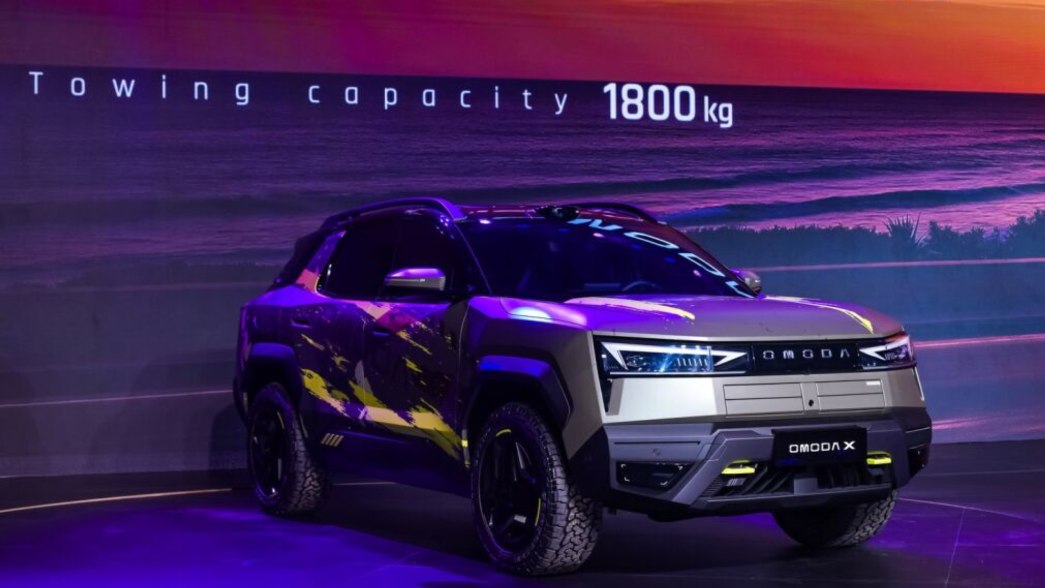 Omoda X crossover SUV in a wide-body, rugged design with all-terrain tyres, revealed at the 2026 International User Summit
