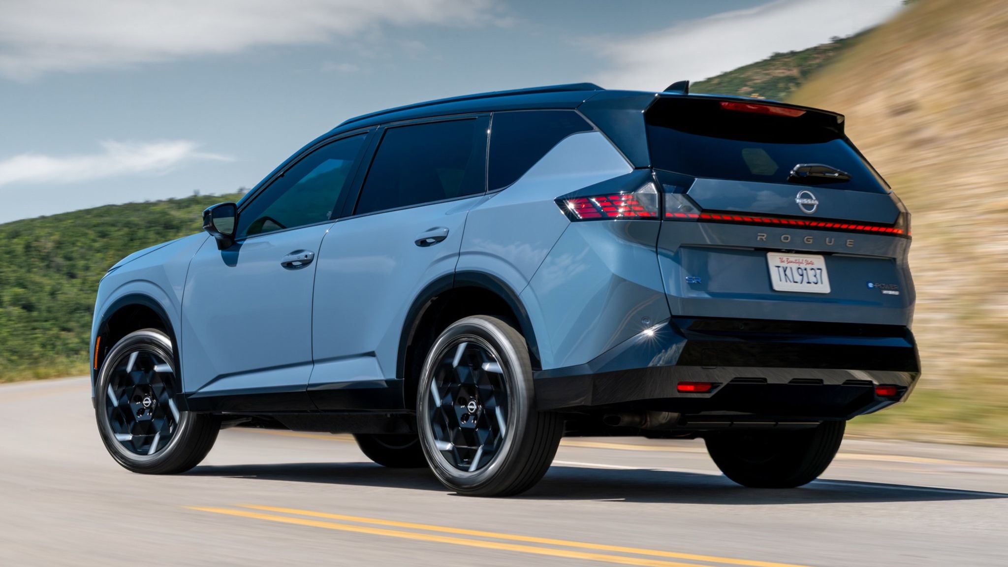 Blue next-generation Nissan Rogue X-Trail e-Power rear