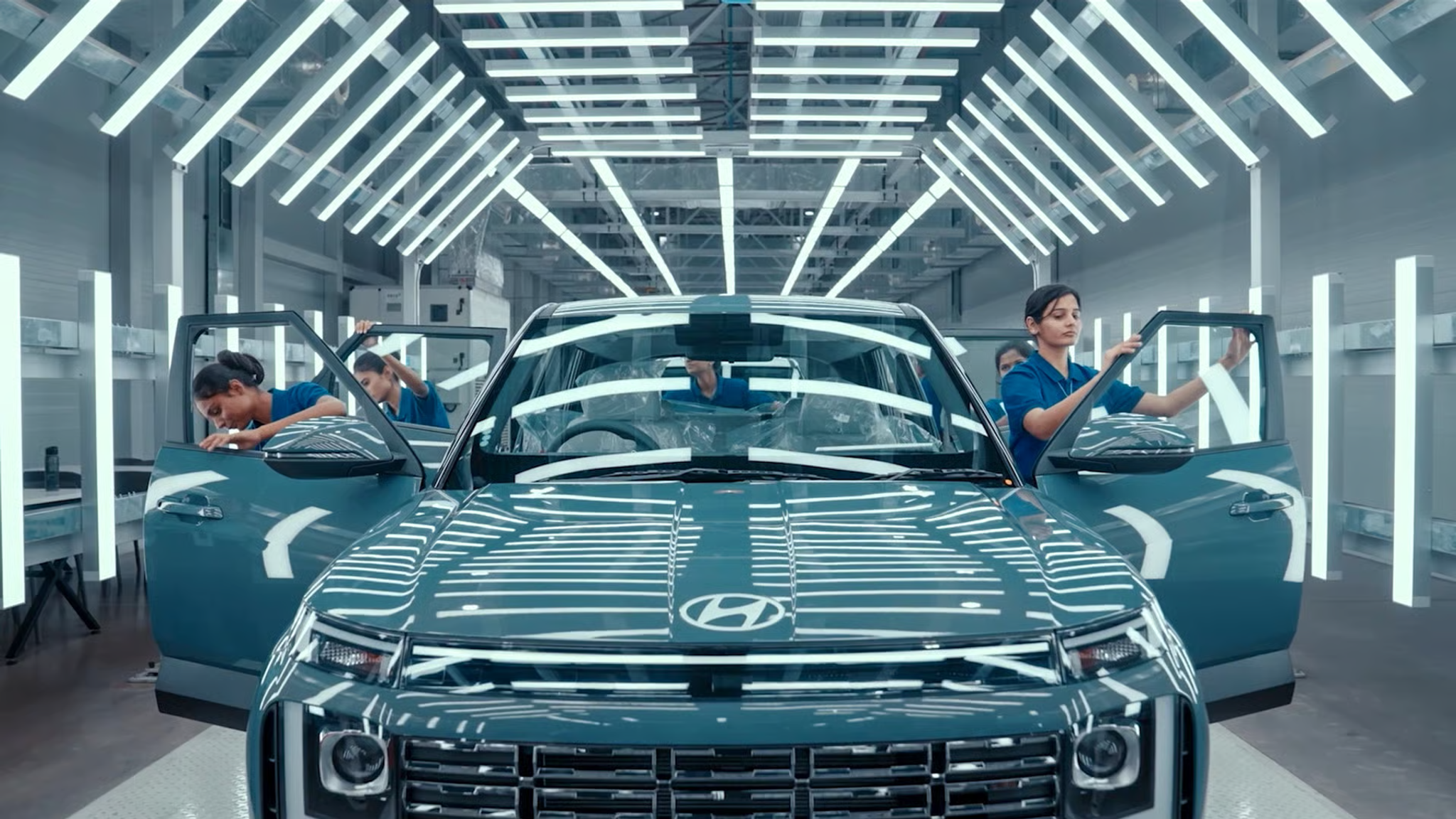 Hyundai vehicles on a production line at a factory, as Hyundai cuts its 2026 sales target