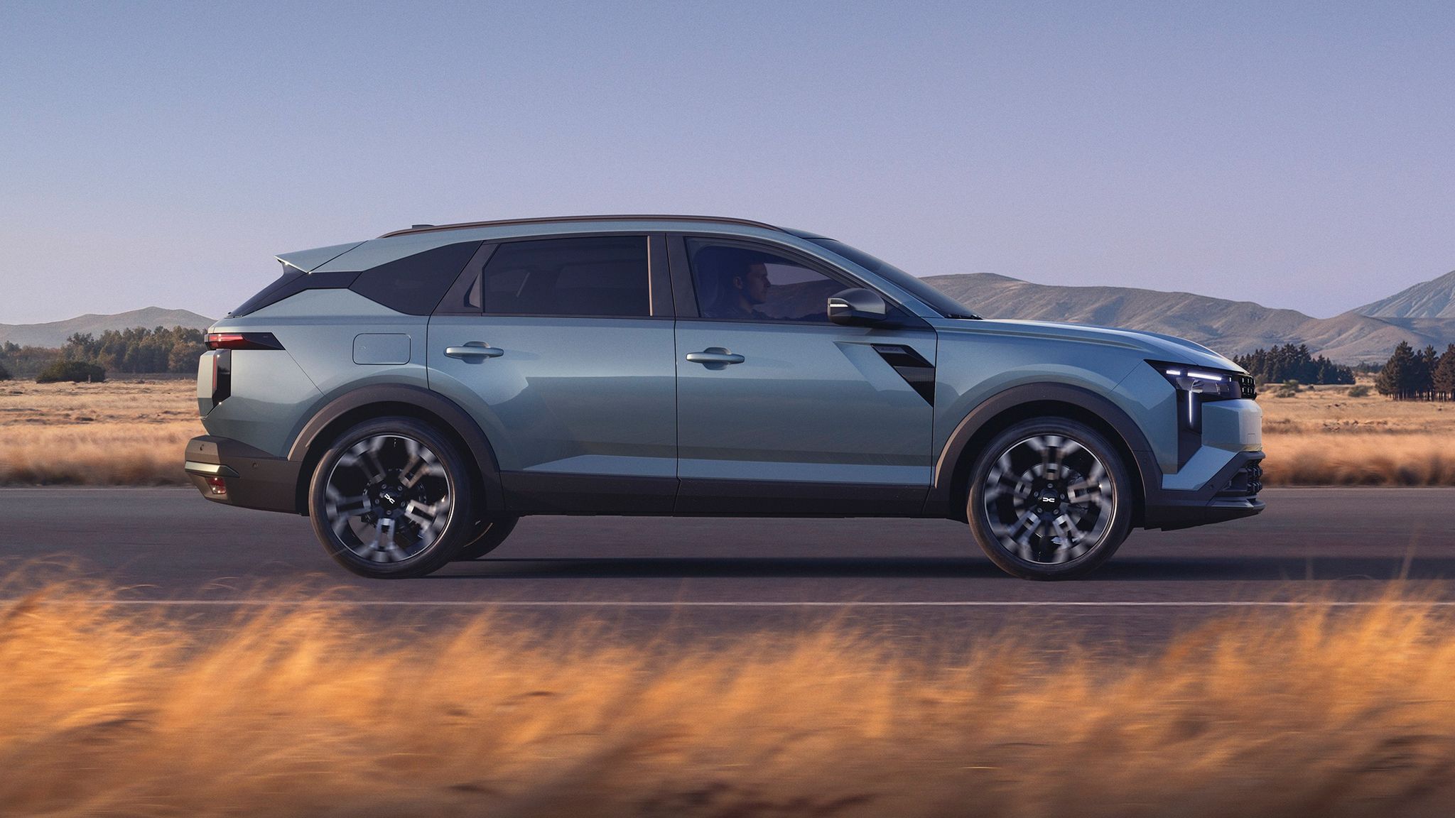 2026 Dacia Striker hybrid crossover side view
