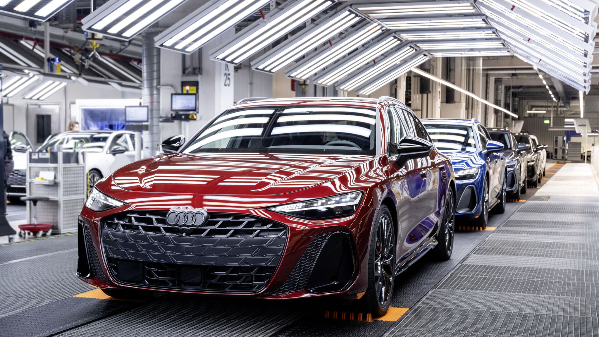 Audi cars lined up, part of the Volkswagen Group that reported a €5.86 billion operating loss