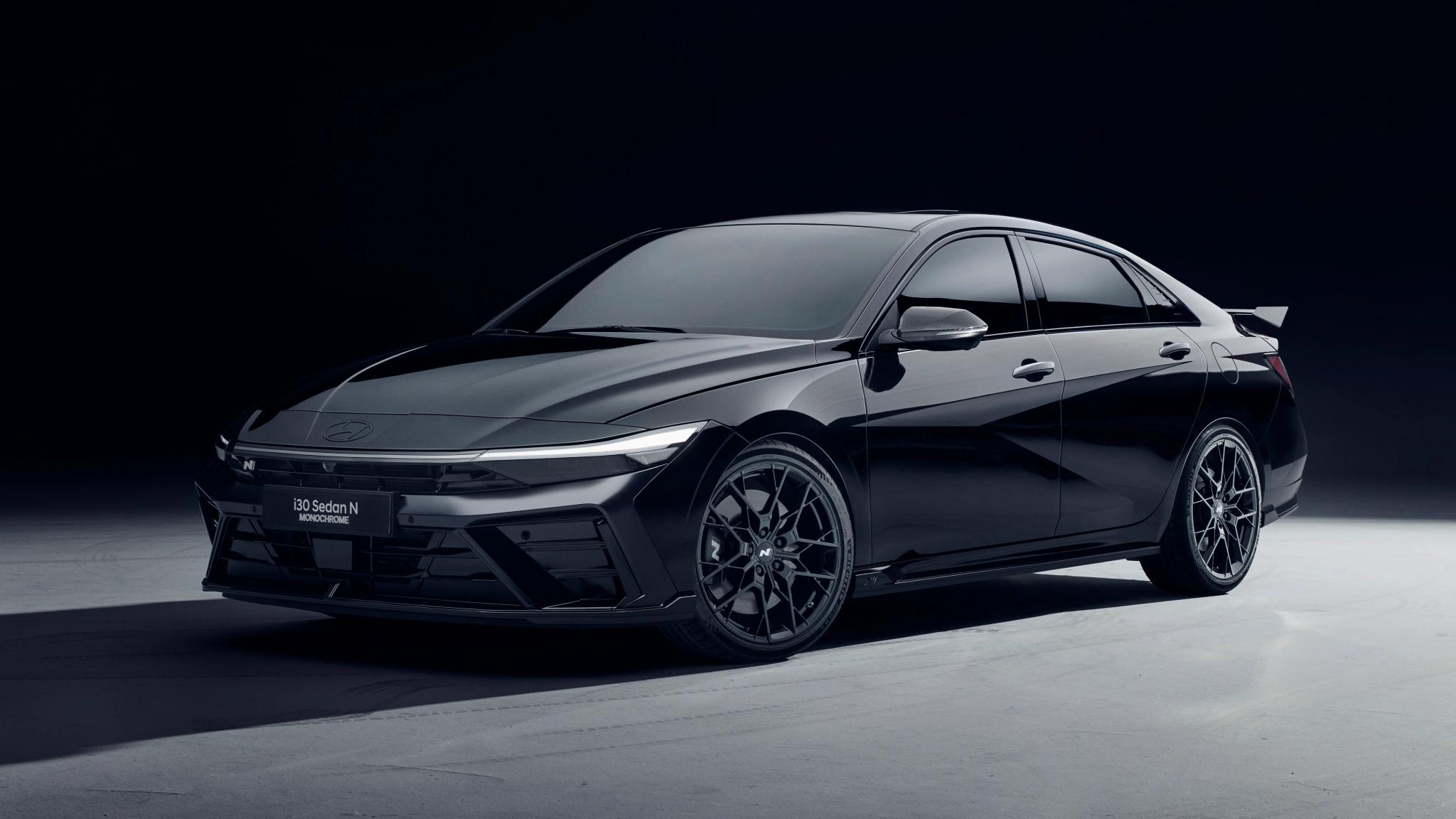 Hyundai i30 Sedan N Monochrome with forged wheels and carbon fibre rear spoiler