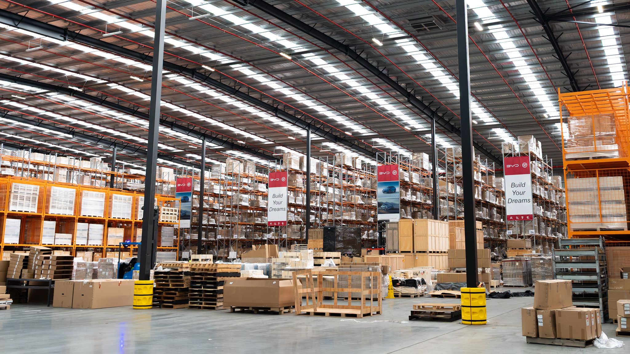 BYD and Denza parts stocked on warehouse shelving at BYD’s Melbourne parts centre