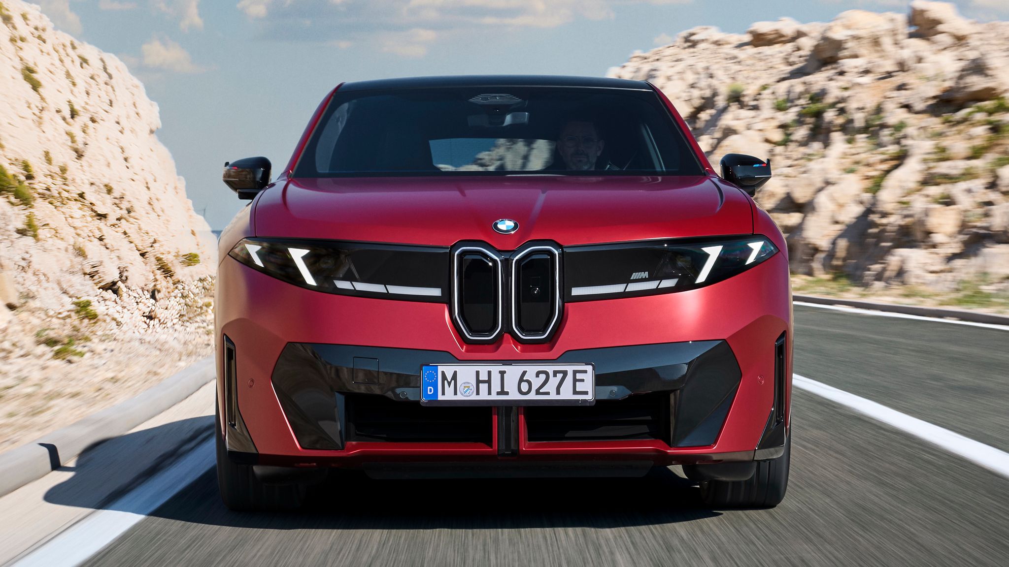 BMW iX4 electric coupe SUV front