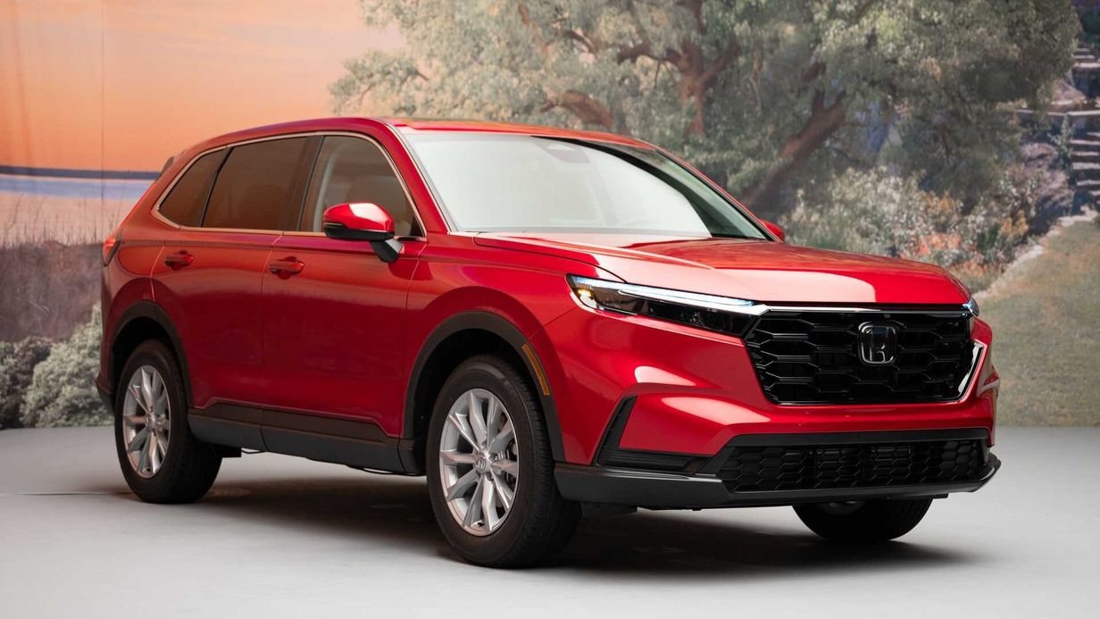 Red 2023 Honda CR-V parked outdoors.