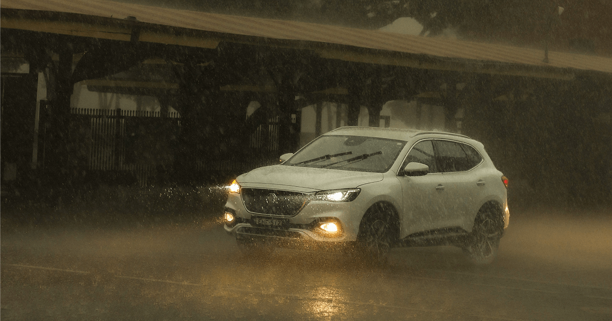 Car driving through bad weather