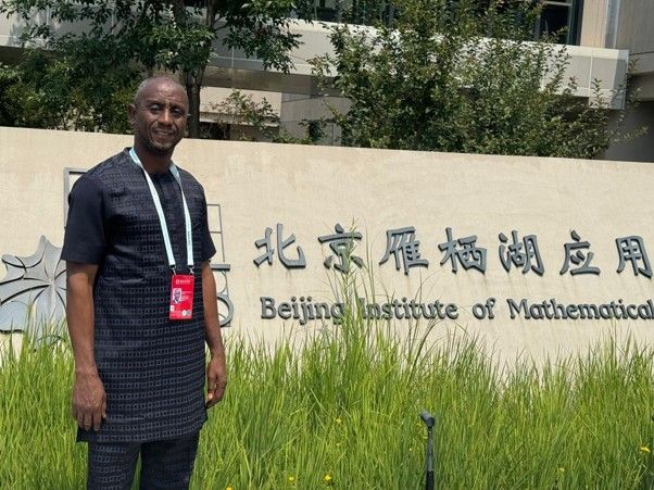 A University for Development Studies representative at a partner institution abroad