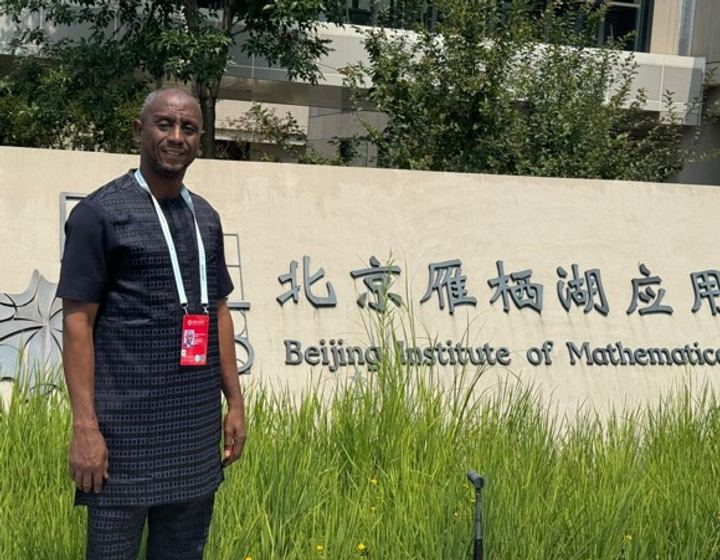 A University for Development Studies representative at a partner institution abroad