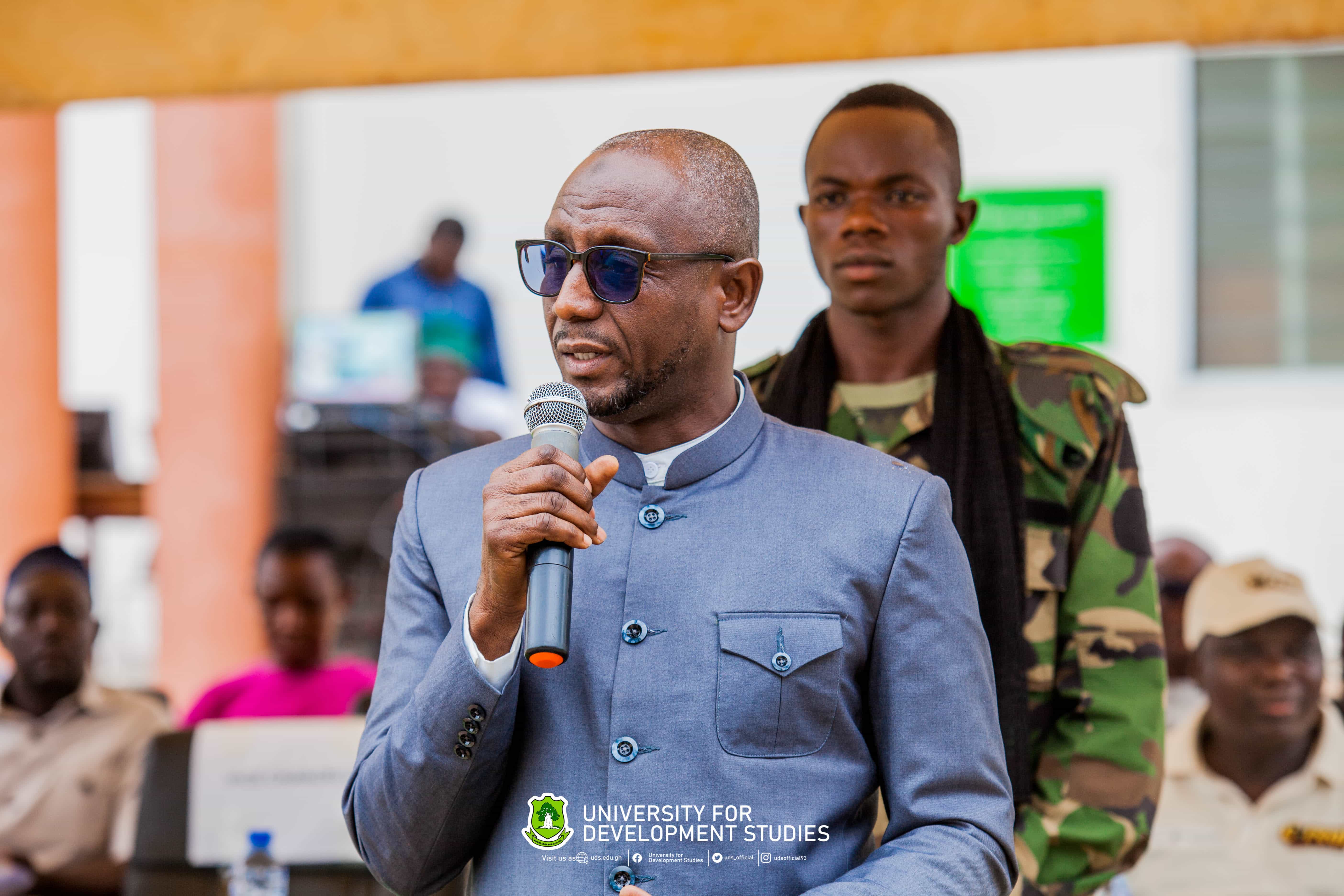 A speaker addressing a University for Development Studies gathering