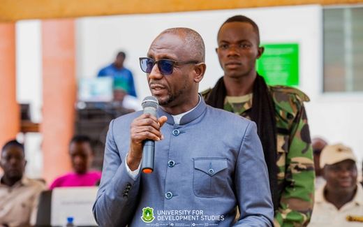 A speaker addressing a University for Development Studies gathering