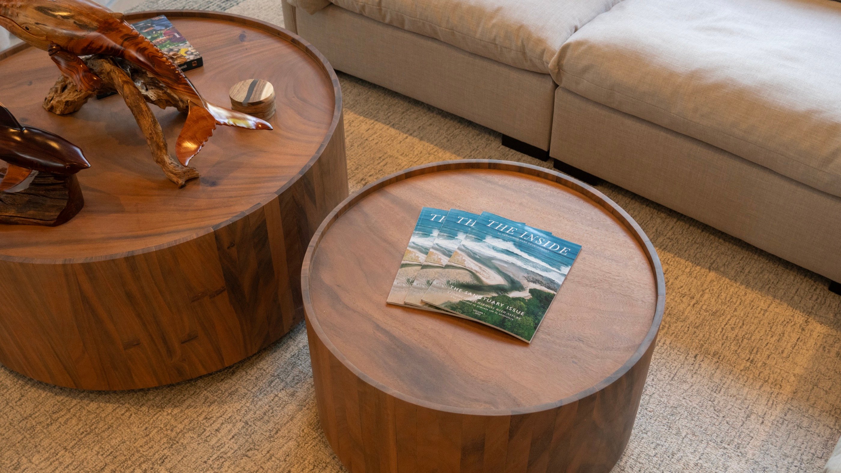 Walnut coffee tables and a linen sofa in a Living Roots living room