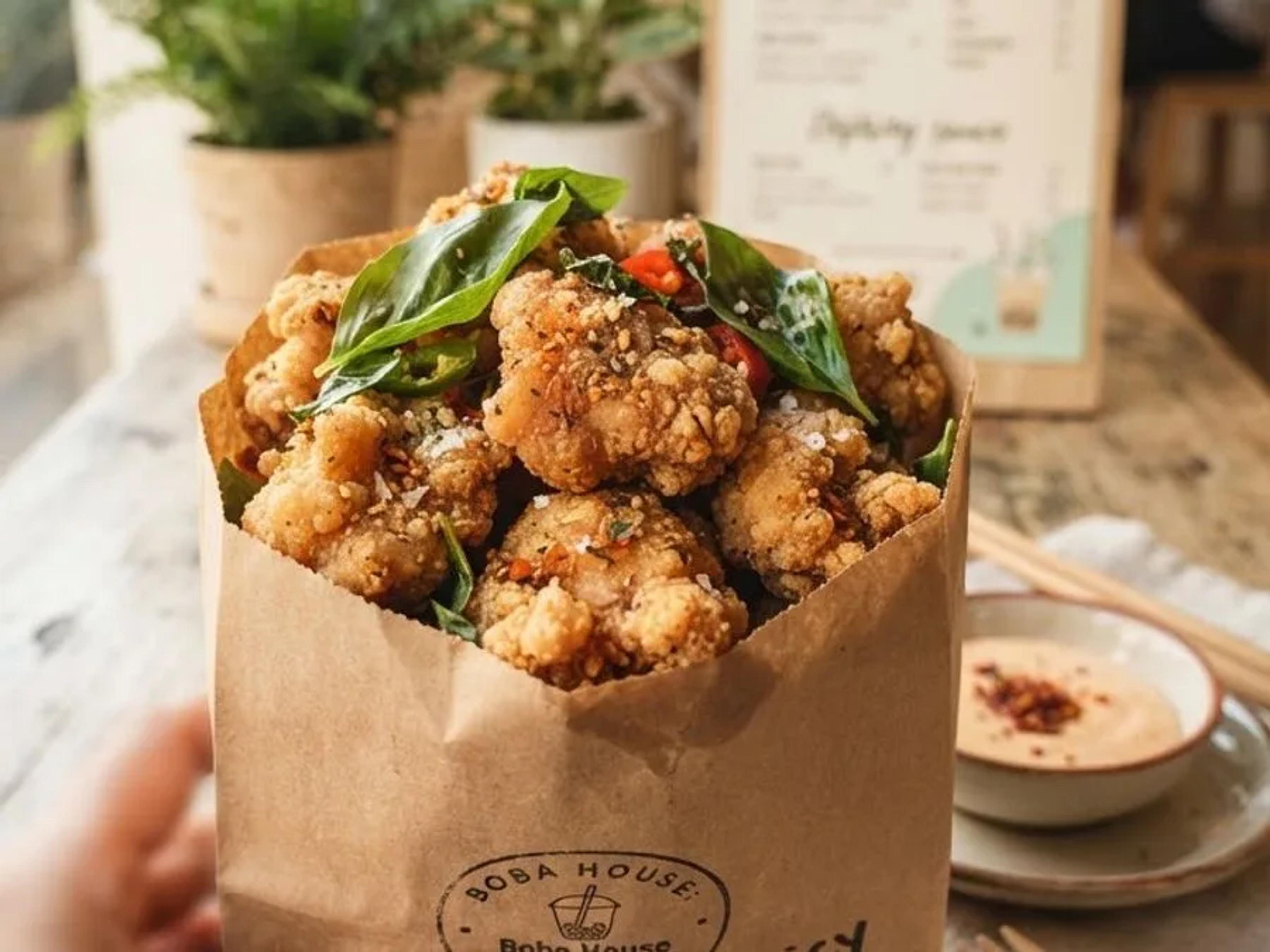 Taiwanese style chicken bites in a Boba House takeaway bag