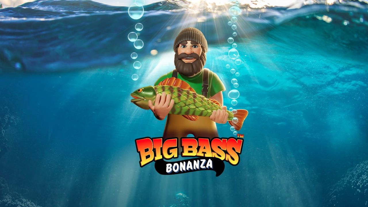a man is holding a large fish in his hands in the water .