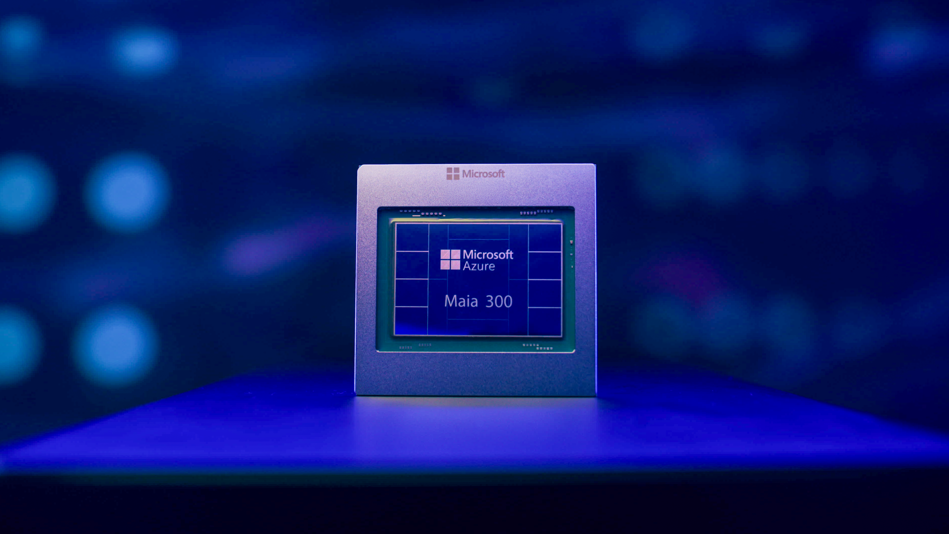 Microsoft Azure Maia 300 chip displayed against a dark blue background with blue and purple light.