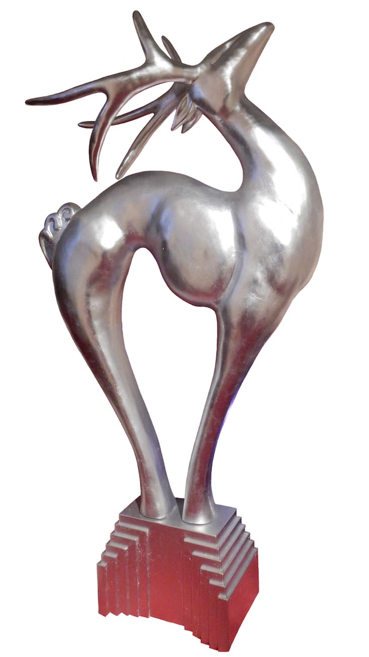 Oversized fiberglass art-deco deer on base in silver paint