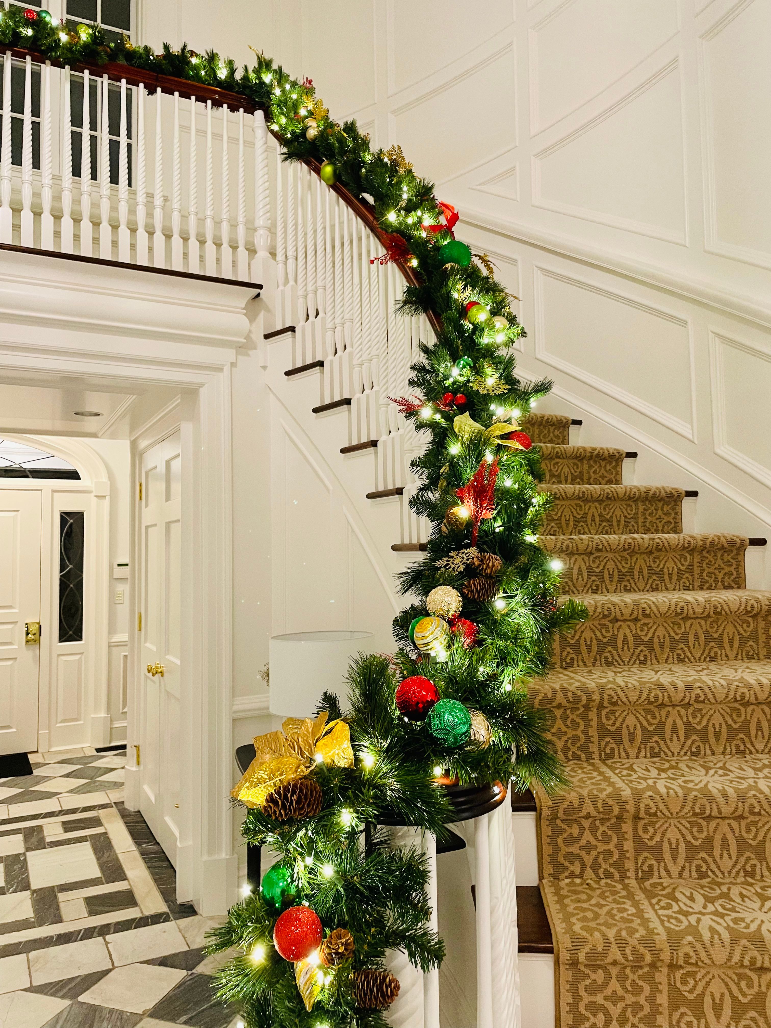 Decorated Christmas garland on staircase