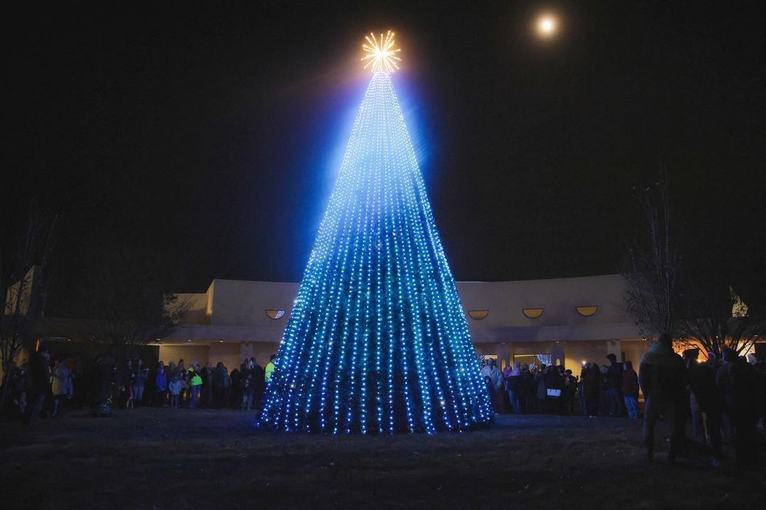 Oversized RGB Pixel Tree at night