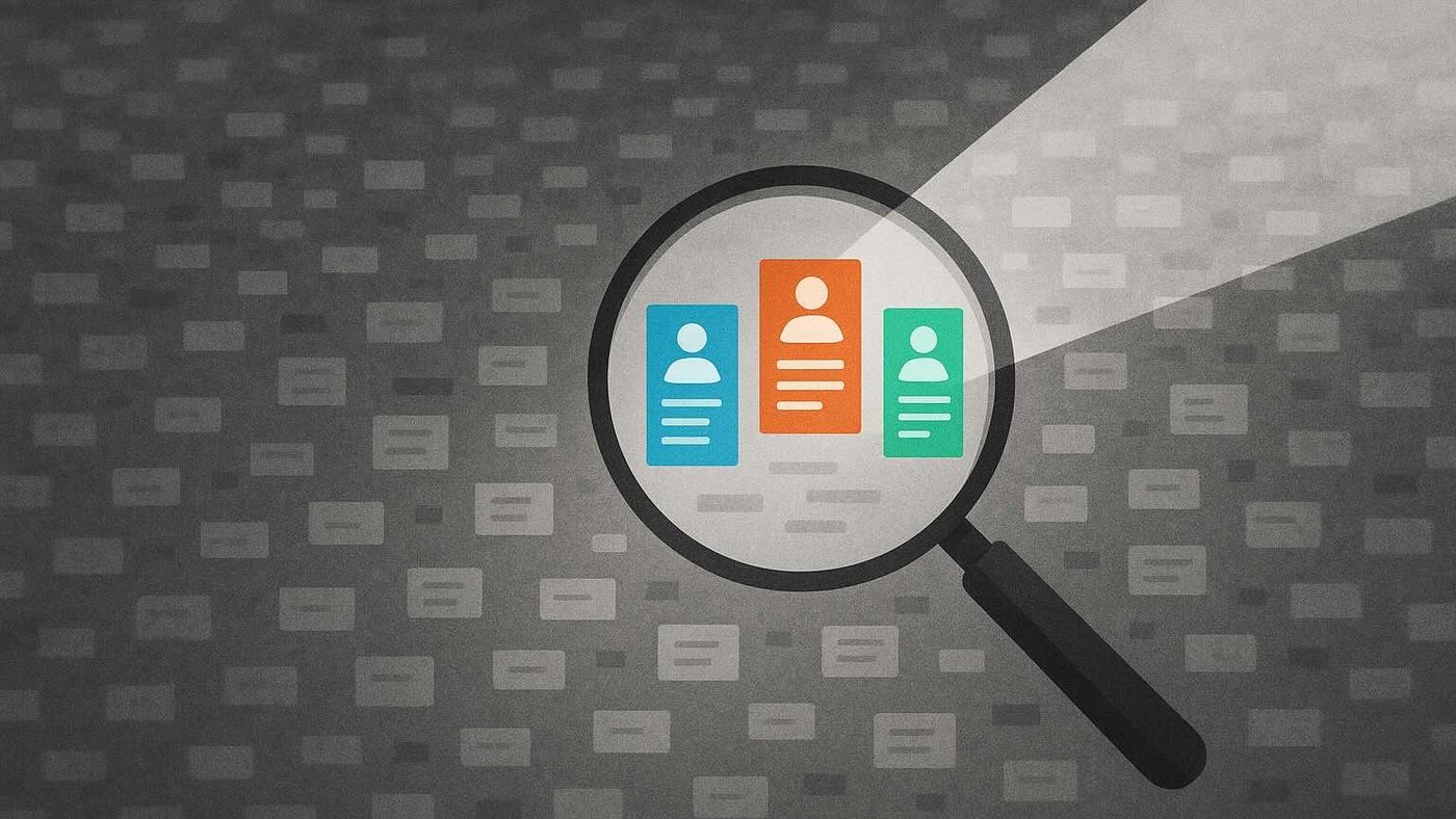 A magnifying glass held over a grey field of indistinct resumes, bringing three coloured candidate profiles into focus.