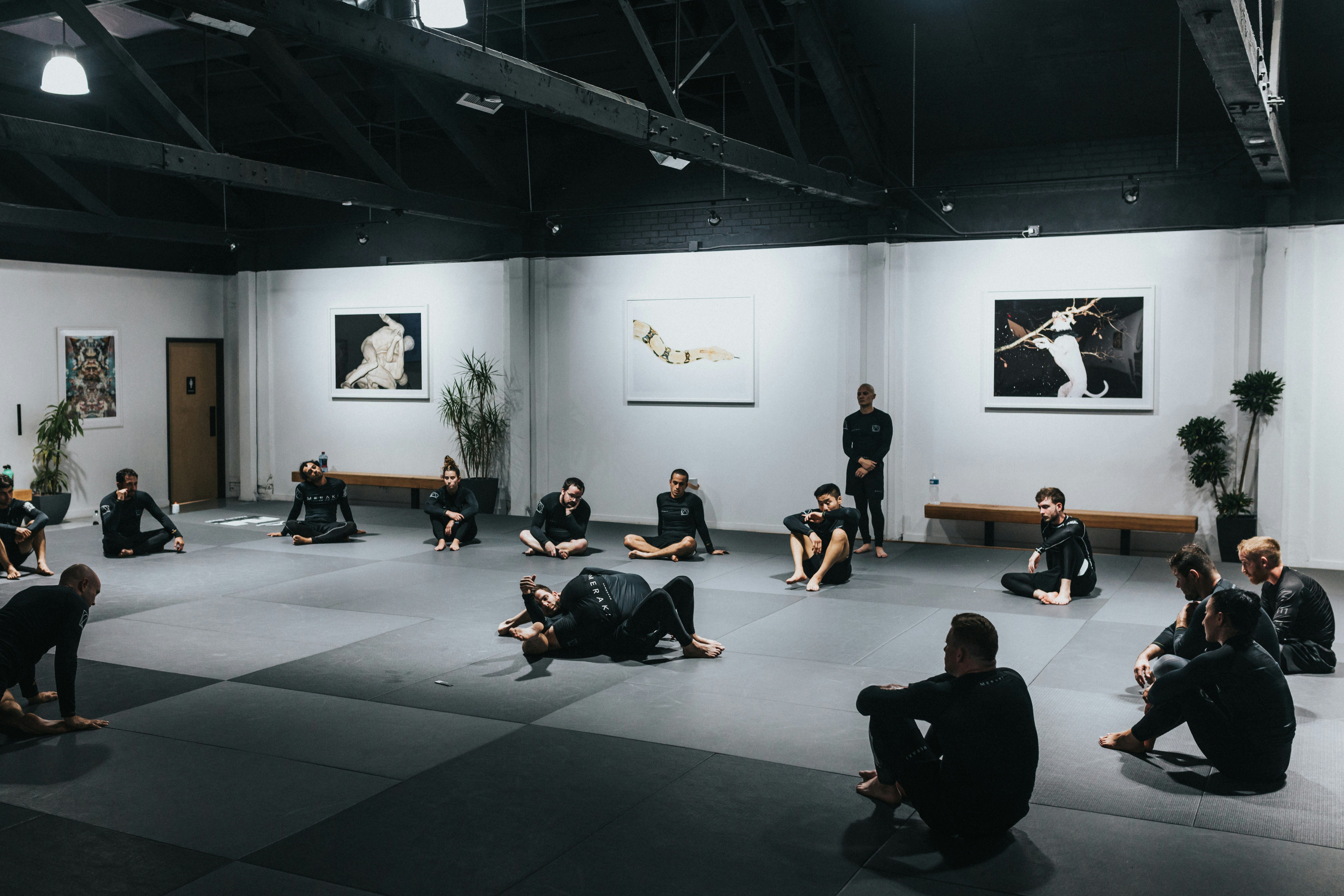 Martial arts dojo with people in practice