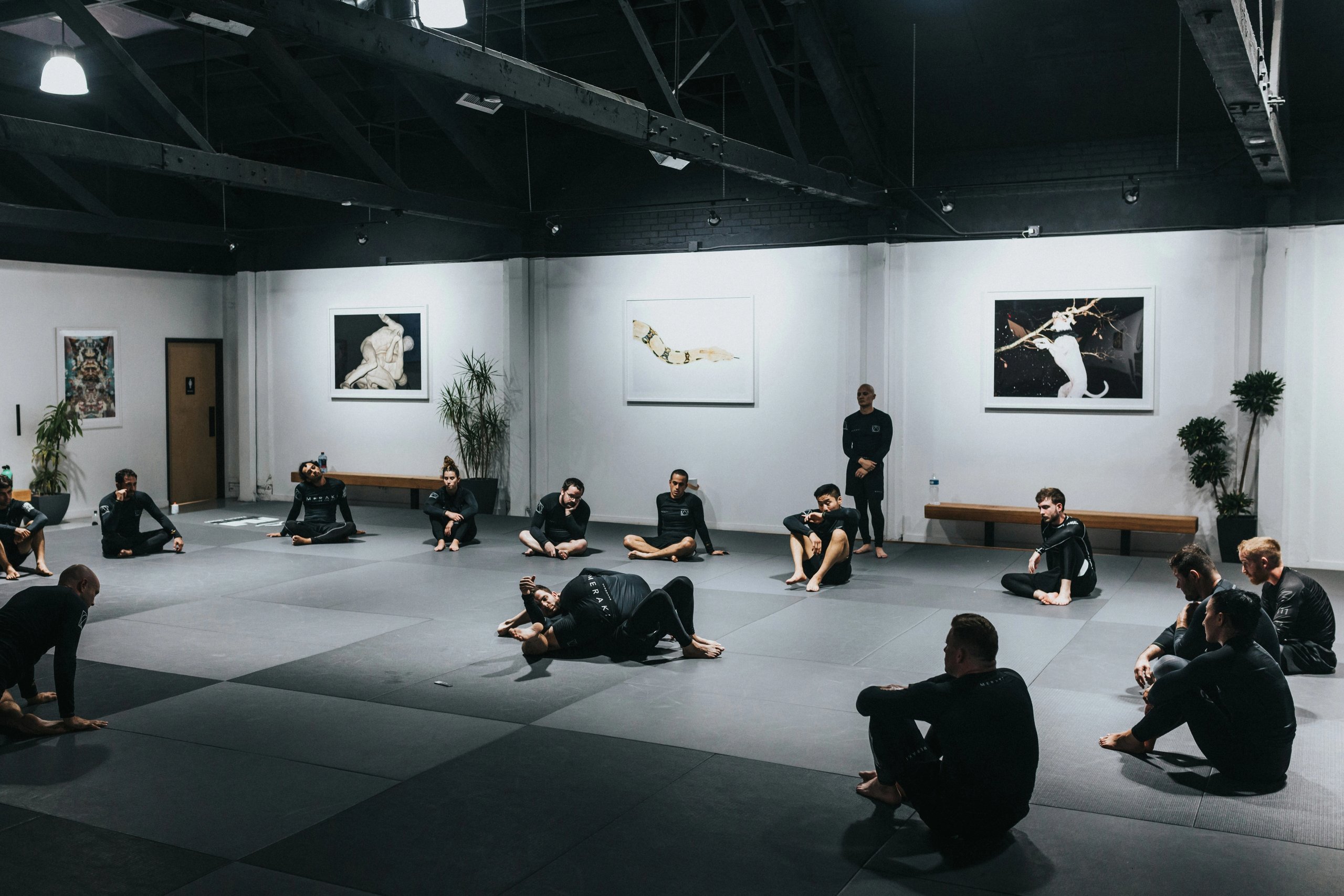 Martial arts dojo with people in practice