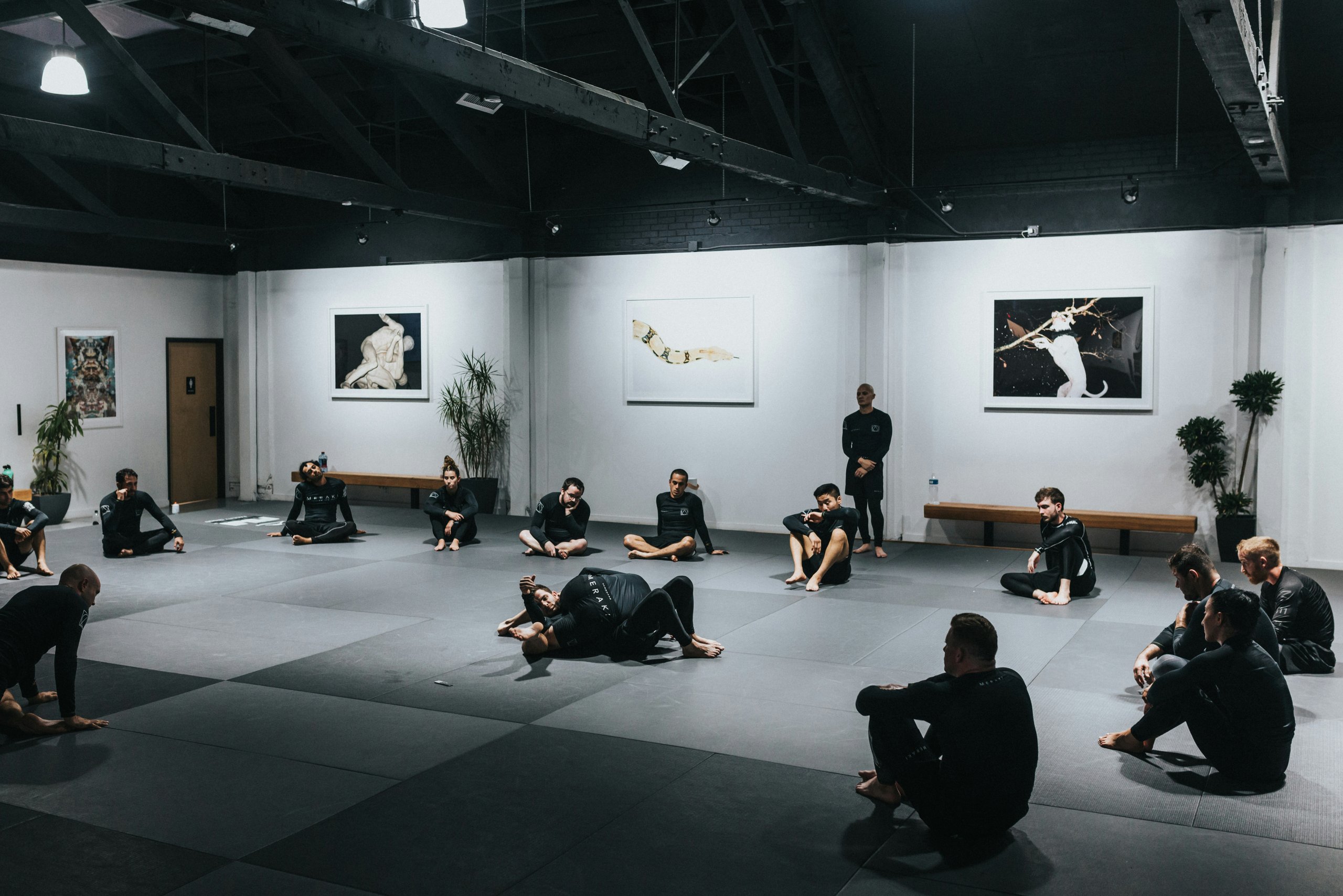 Martial arts dojo with people in practice