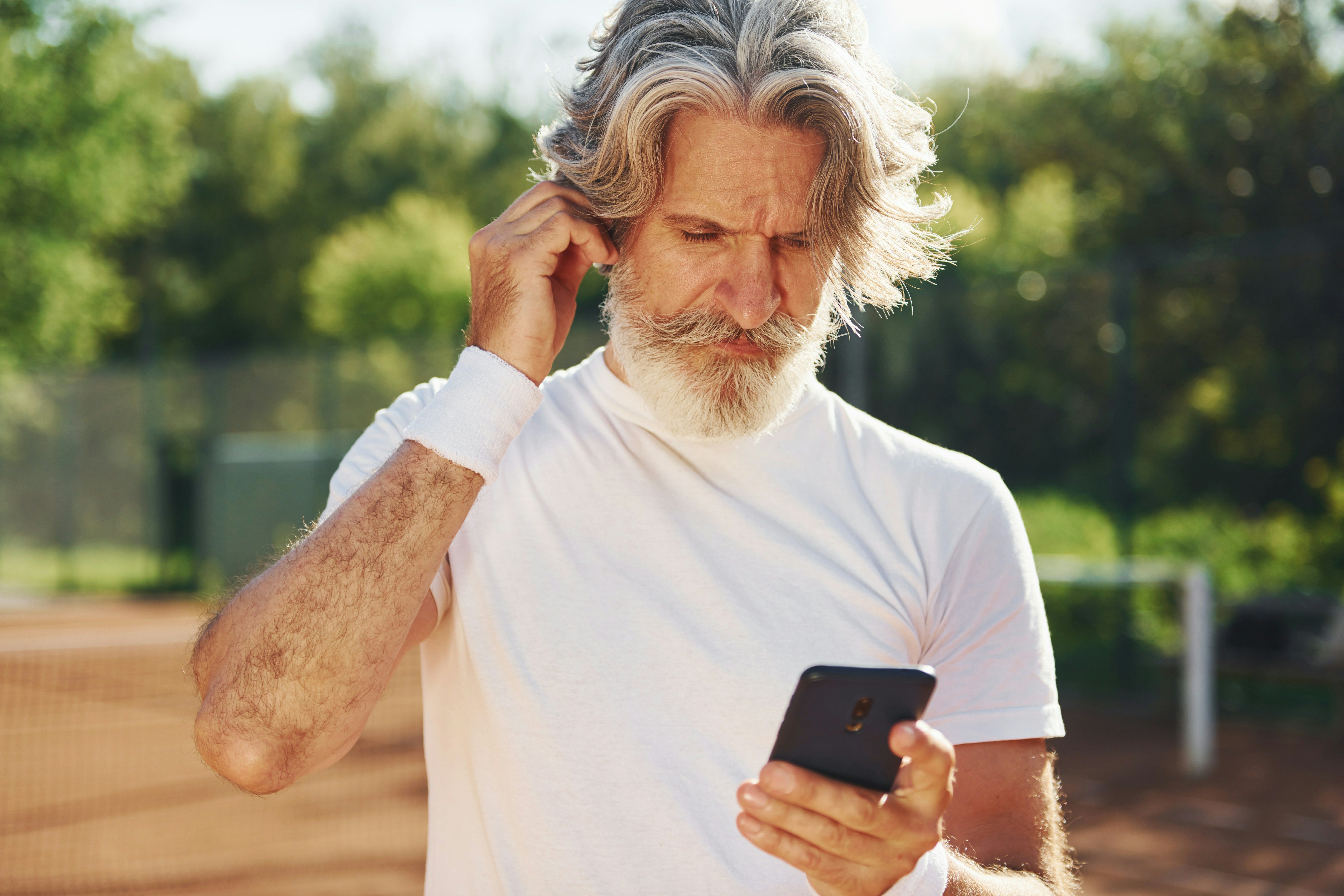 Tennis player booking a court with the 1club member app