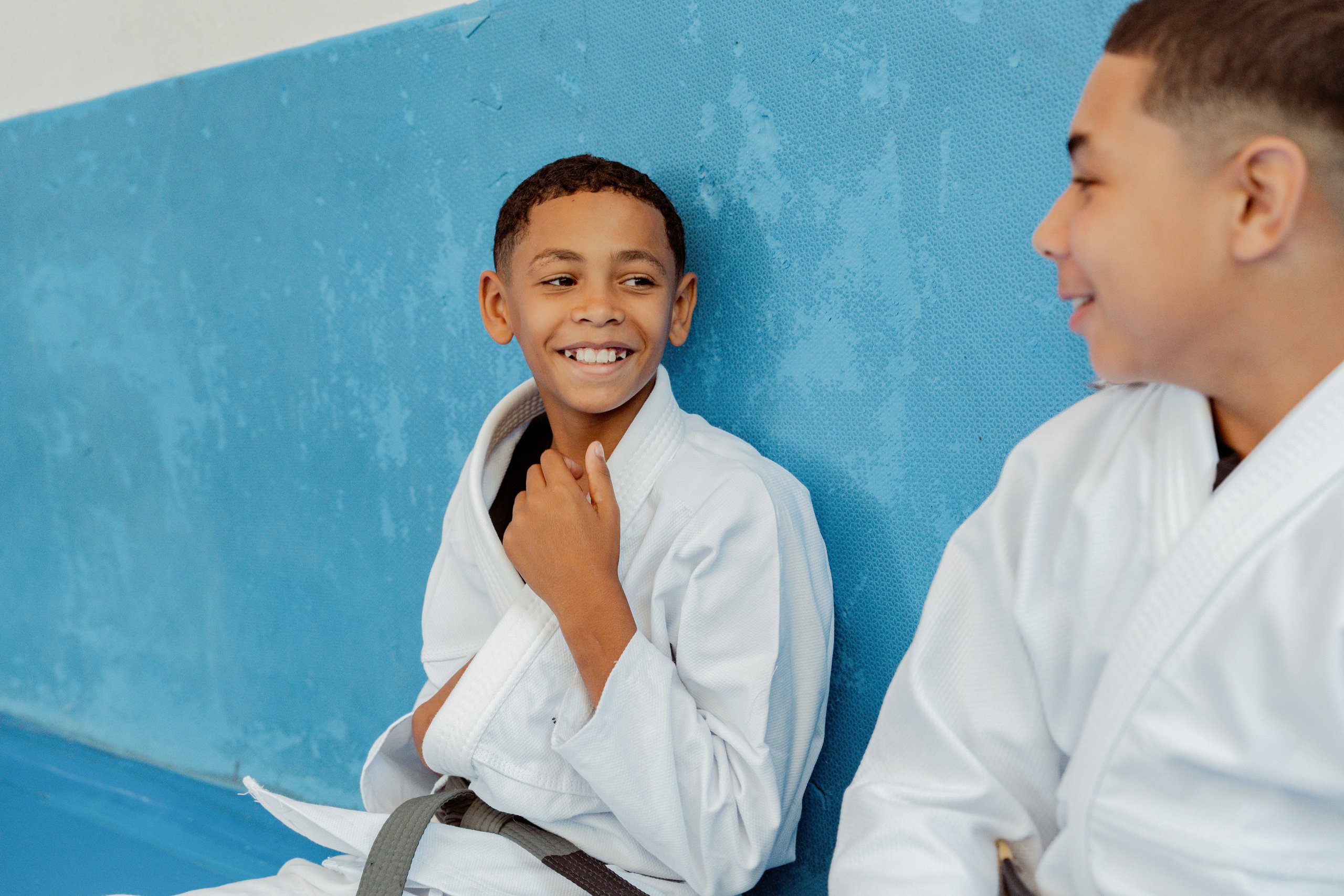 Kids lined up for a BJJ class