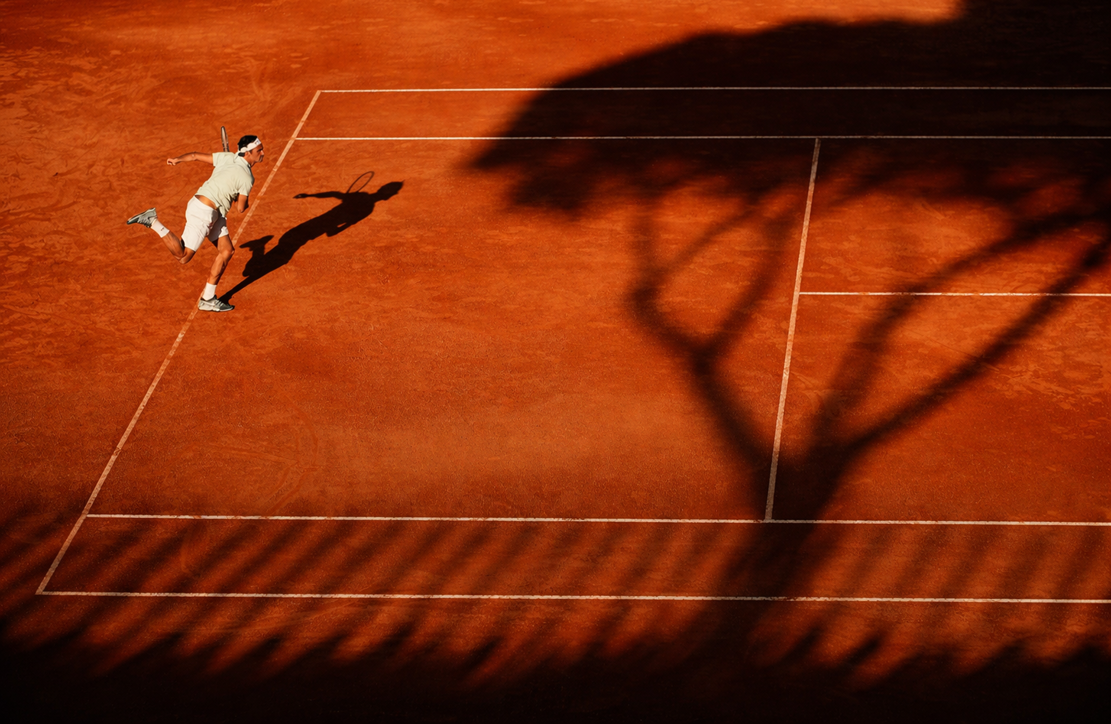 Tennis player hitting a serve