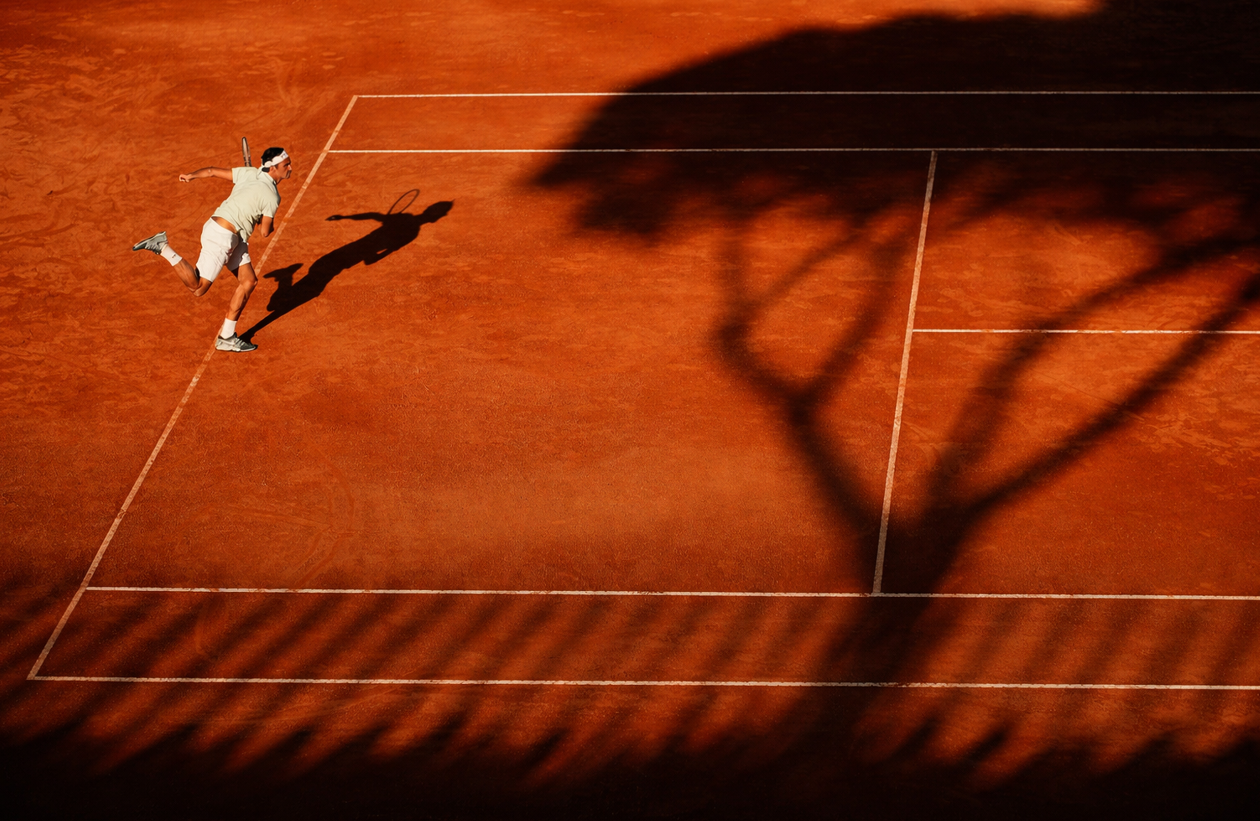 Tennis player hitting a serve