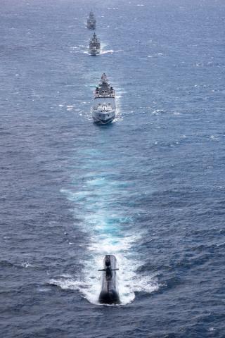 HMAS Rankin leads Indian Navy Ships Shivalik and Kadmaat and HMAS Warramunga during AUSINDEX 21.