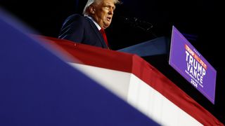 Donald Trump points at a crowd