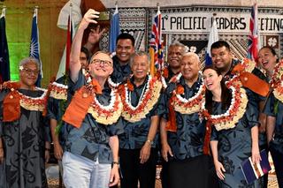 Australia’s Prime Minister Anthony Albanese takes a selfie with fellow leaders during the Pacific Islands Forum in Suva, July 2022.