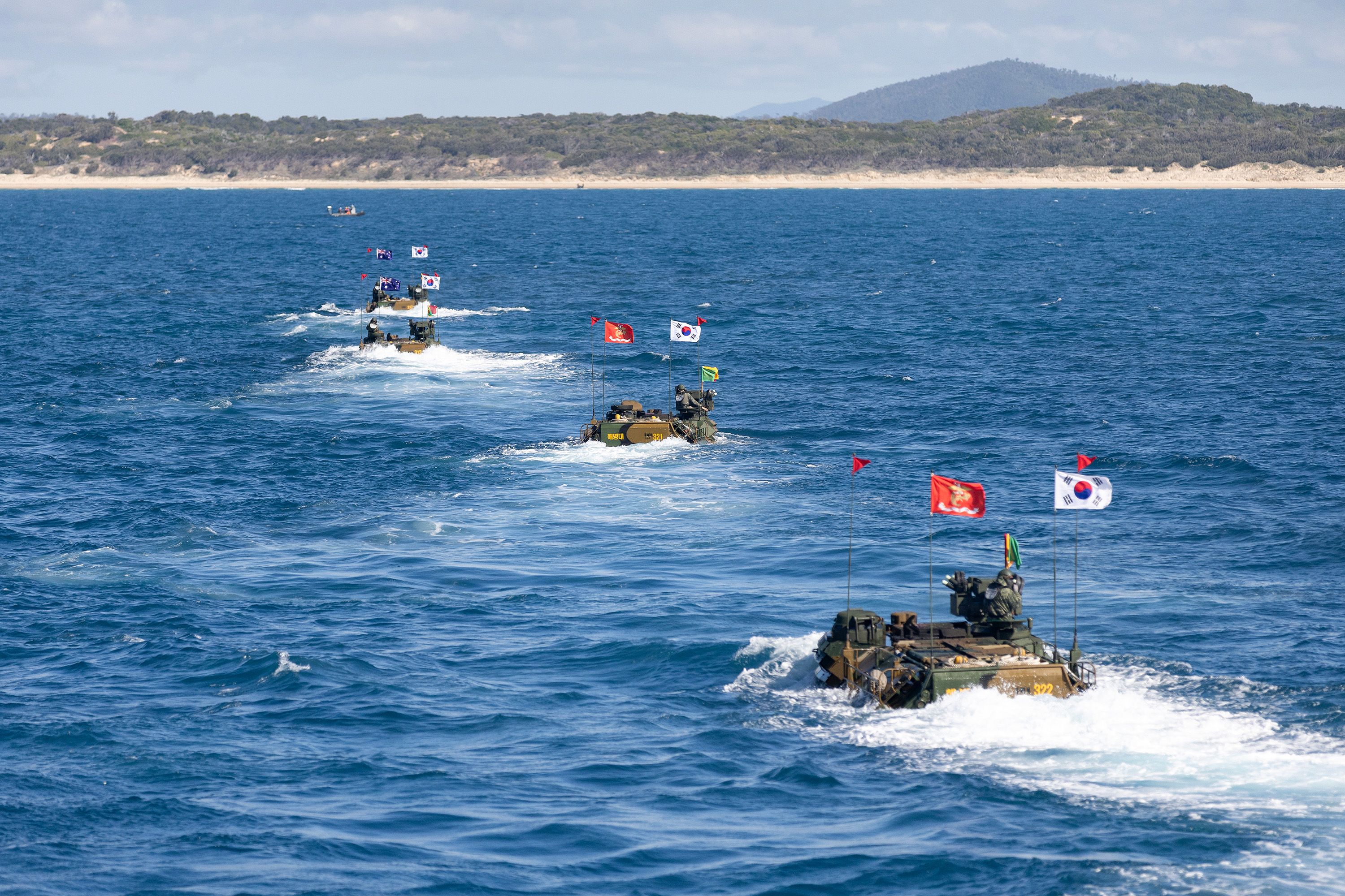 Republic of Korea Marine Corps Amphibious Assault Vehicles approach the beach from ROKS Marado during Exercise Talisman Sabre 23.